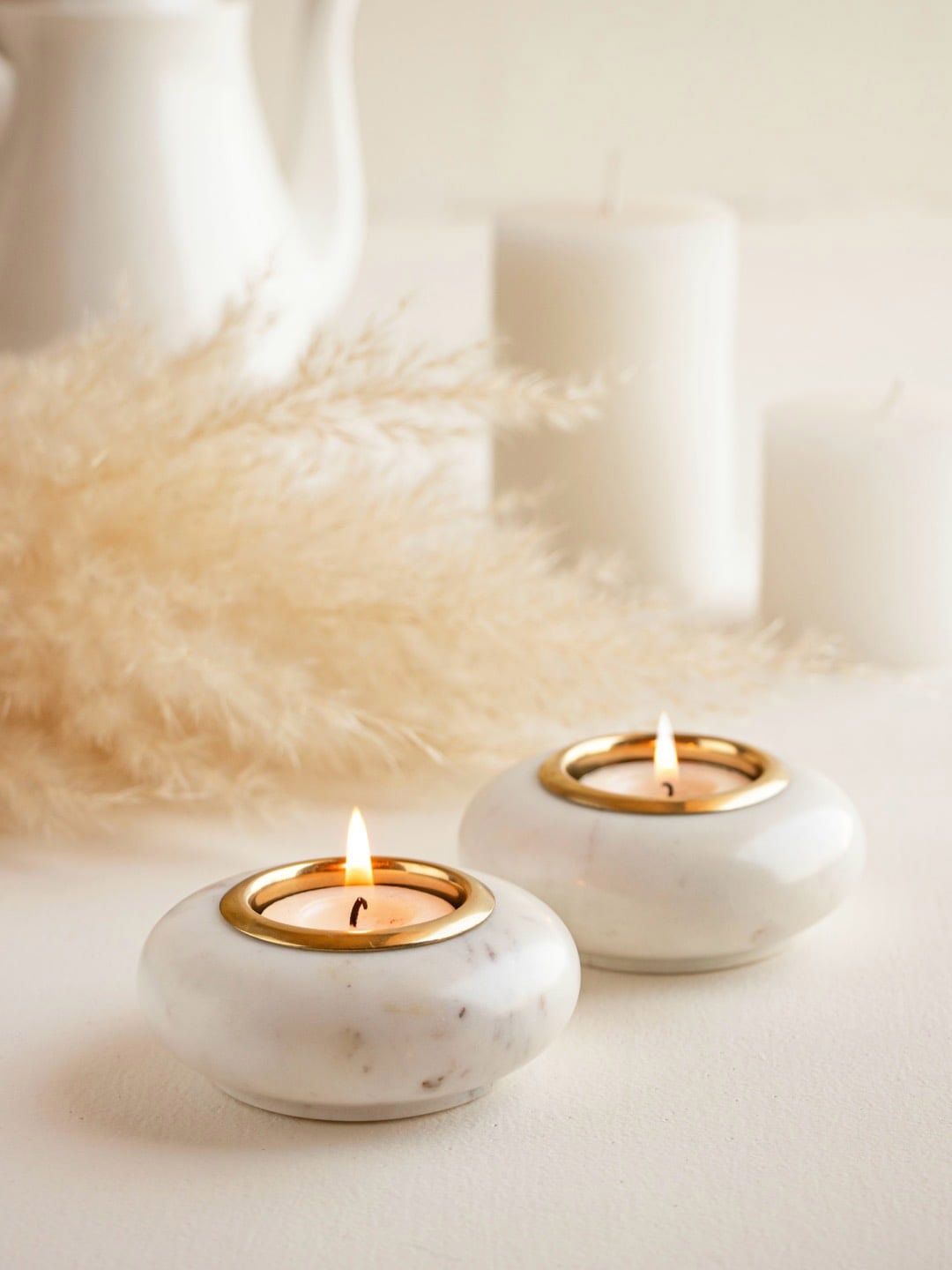 

Marbleous 2 Pieces Textured Oval Shaped Ceramic Tealight Candle Holders, White