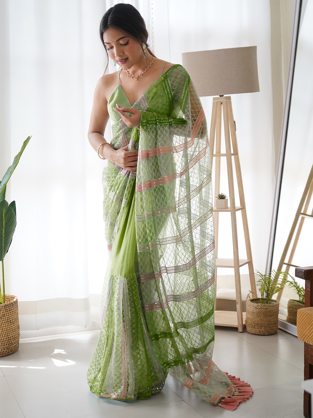 

Celeb Styles Embellished Sequined Net Saree, Green