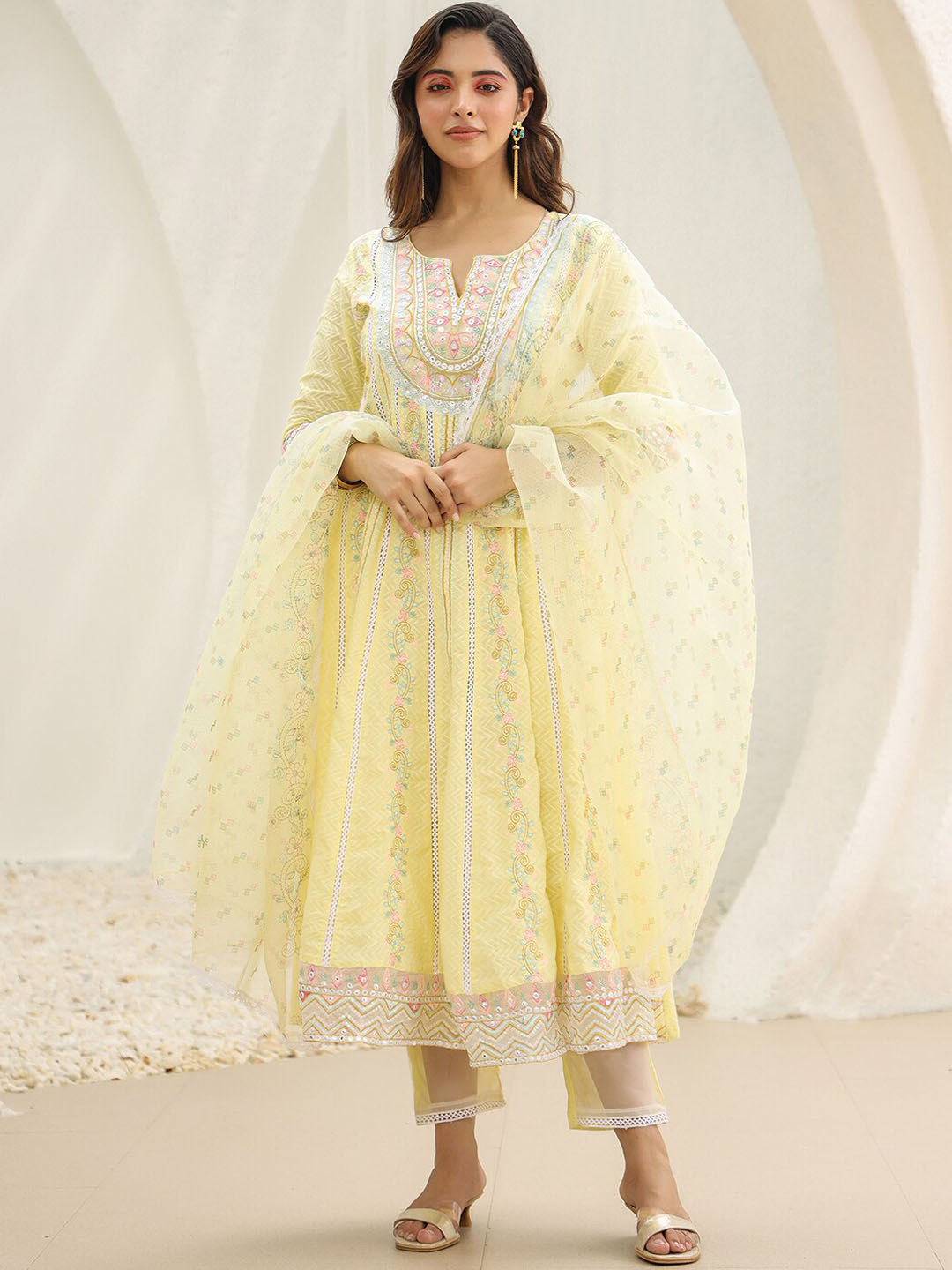 

Vishudh Yellow Floral Mirror Work Pure Cotton Notched Neck Kurta & Trouser & Dupatta