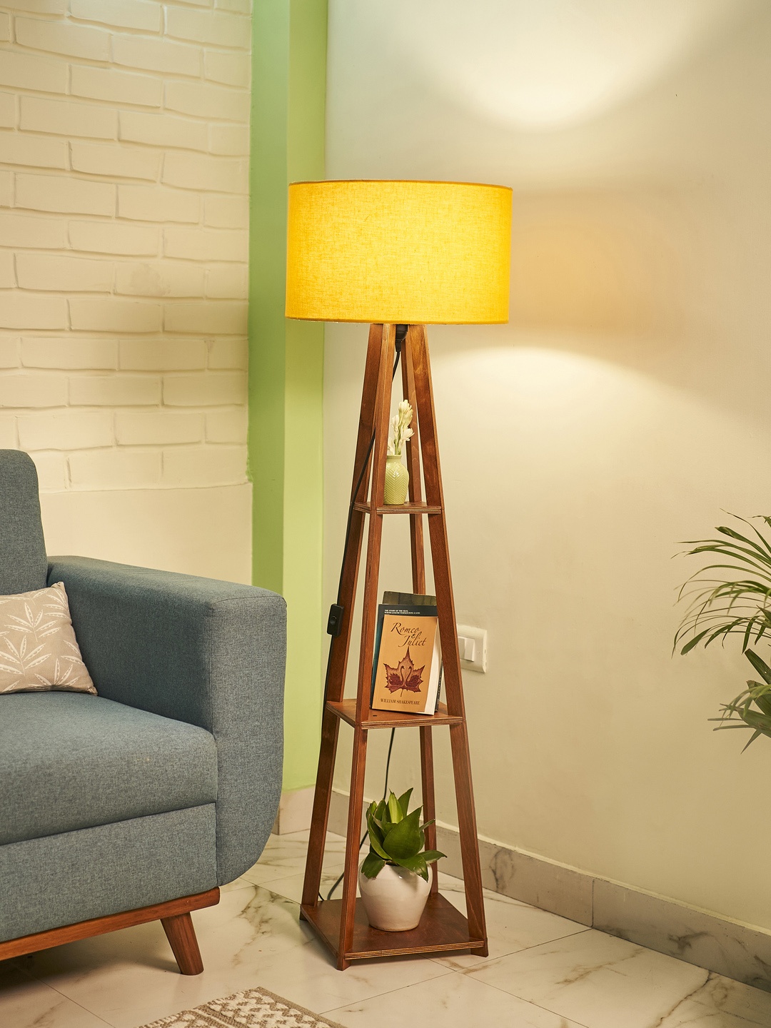 

Crosscut Yellow & Brown Wooden Cylinder Shaped Floor Lamp With Shelves
