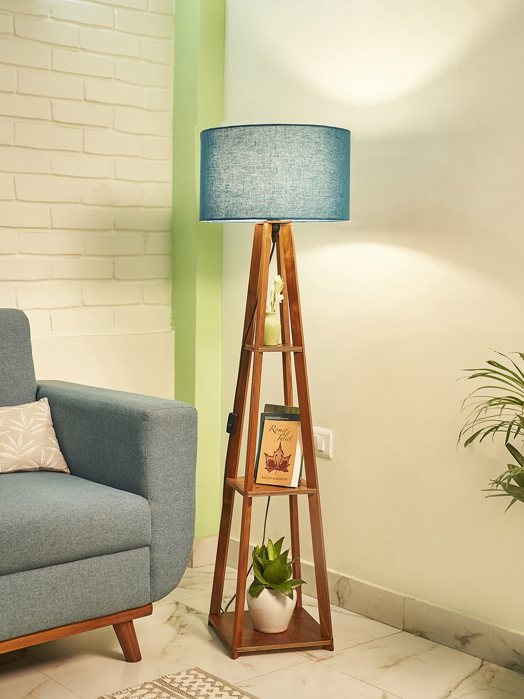 

Crosscut Blue & Brown Wooden Cylinder Shaped Floor Lamp With Shelves