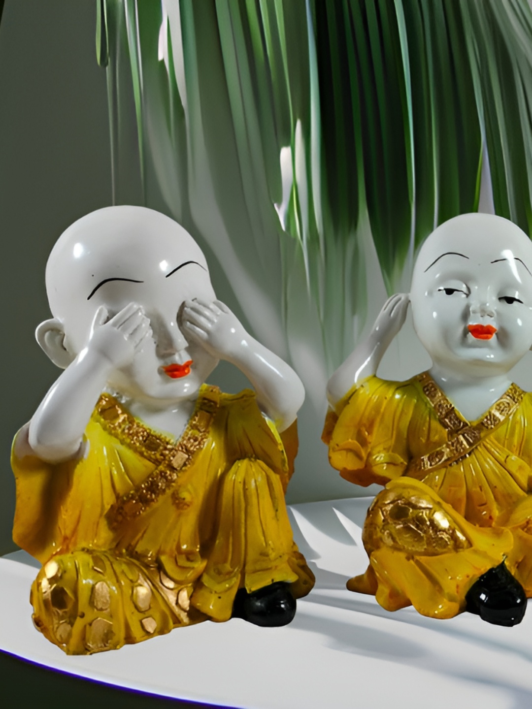 

SANKALAN CREATIONS Yellow 2 Pcs Laughing Buddha Showpiece