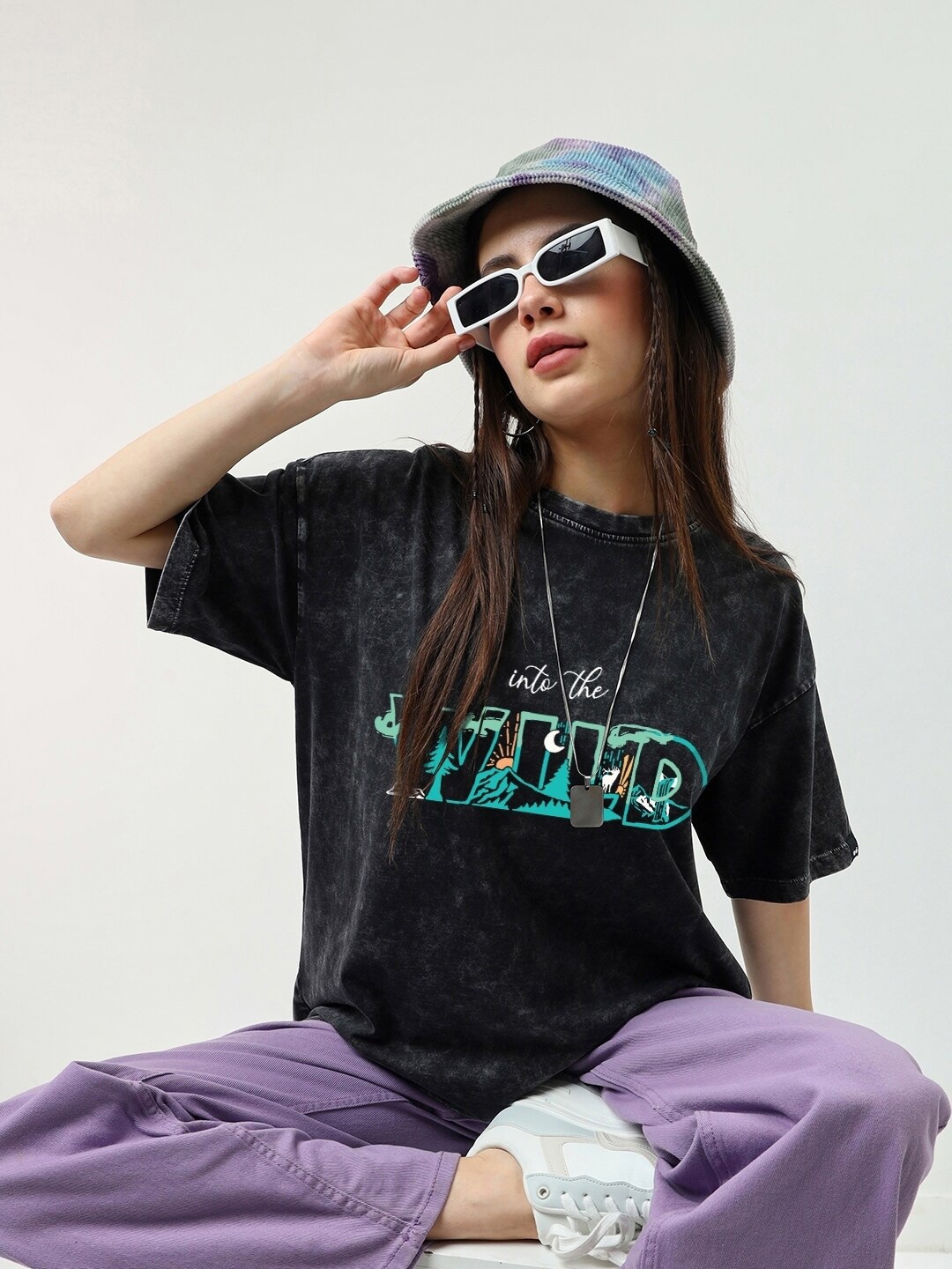 

Bewakoof Into The Wild Graphic Printed Drop-Shoulder Sleeves Oversized Cotton T-shirt, Black