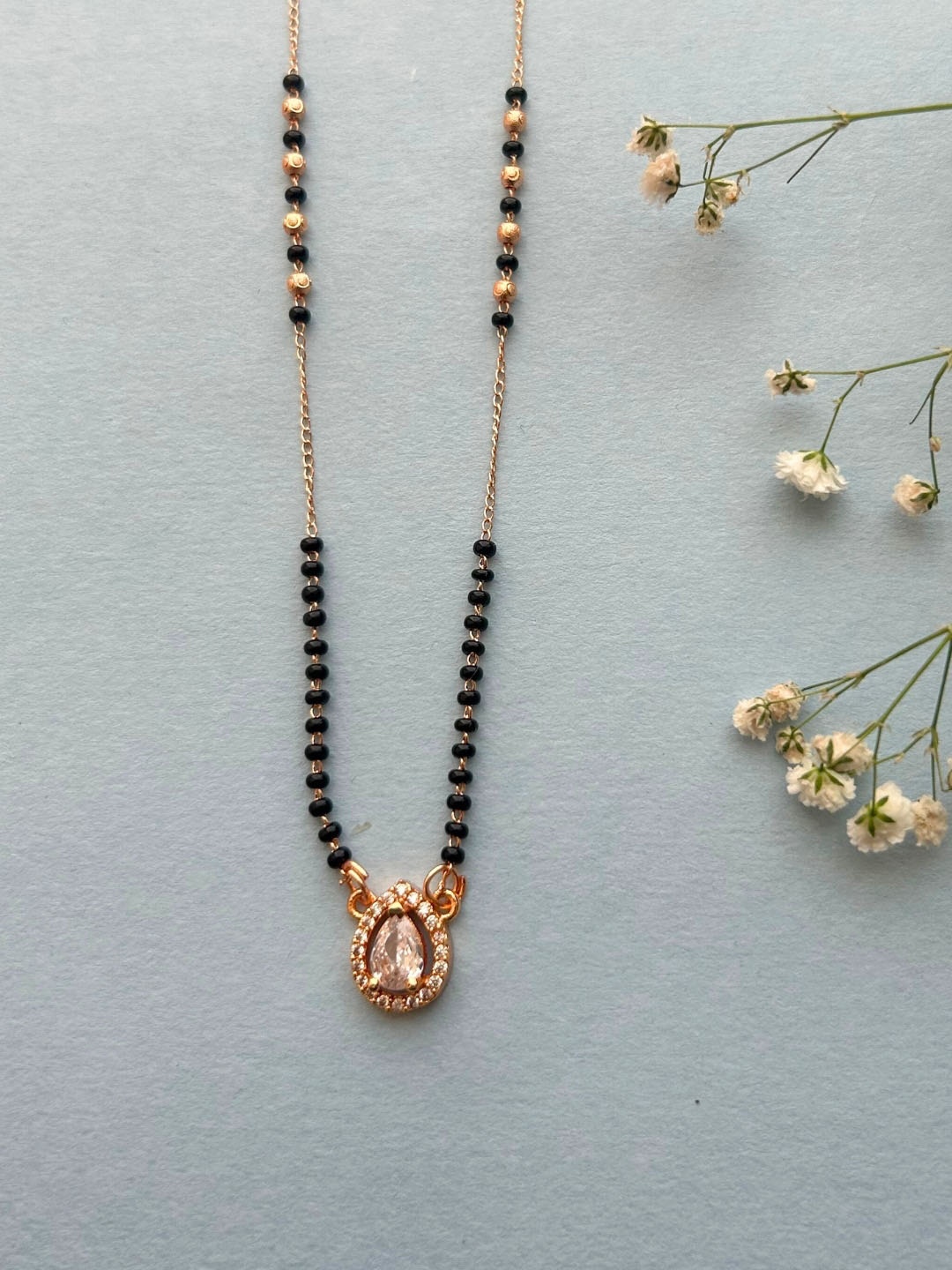 

Zeraki Jewels Rose Gold Plated Artificial Stones and Beads Mangalsutra