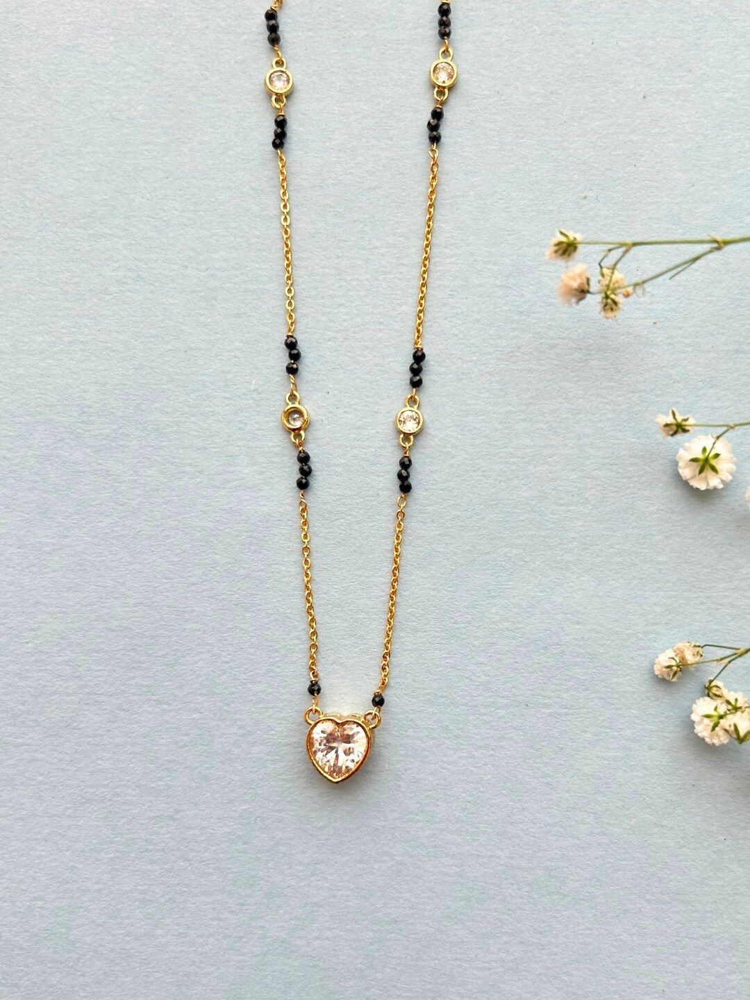 

Zeraki Jewels Rose Gold Plated Artificial Stones and Beads Mangalsutra