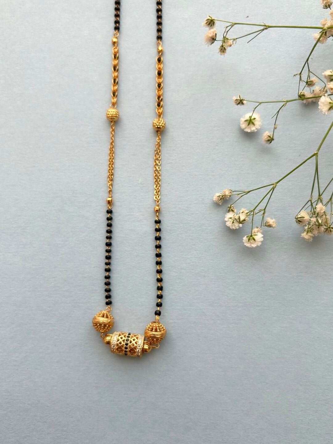 

Zeraki Jewels Gold Plated Artificial Stones and Beads Mangalsutra