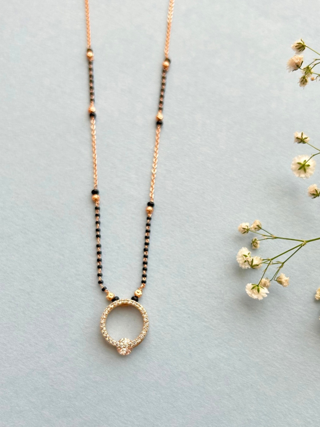 

Zeraki Jewels Rose Gold Plated Artificial Stones and Beads Mangalsutra