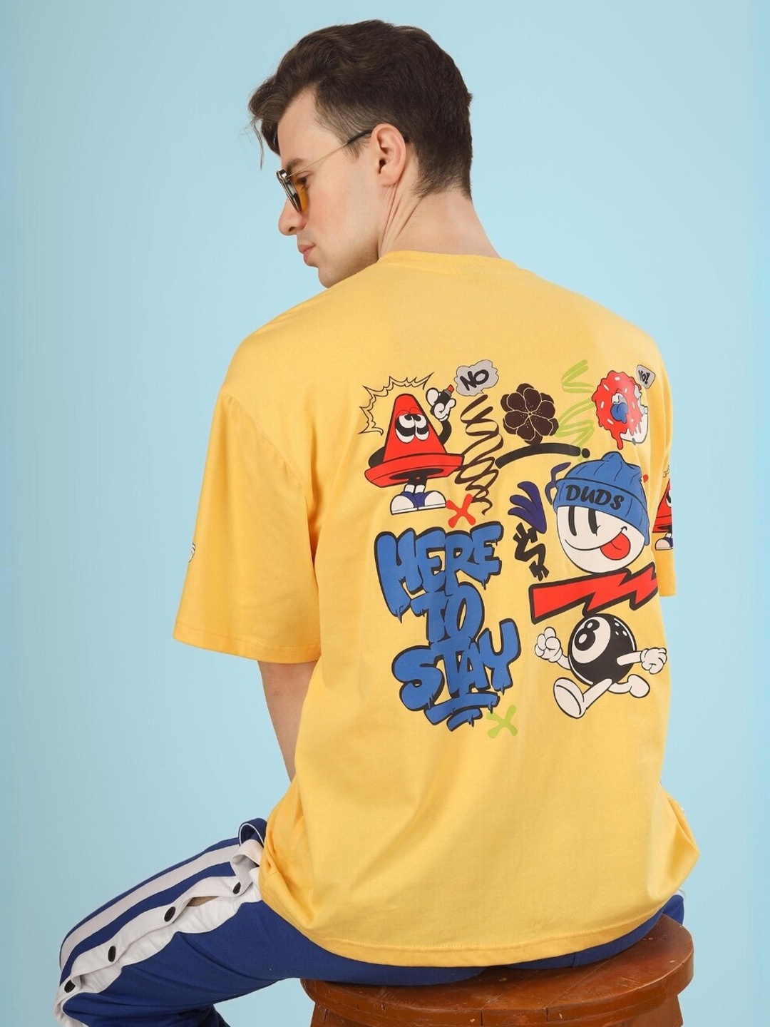 

WEARDUDS Here To Stay Printed Drop-Shoulder Sleeves Oversized T-shirt, Yellow