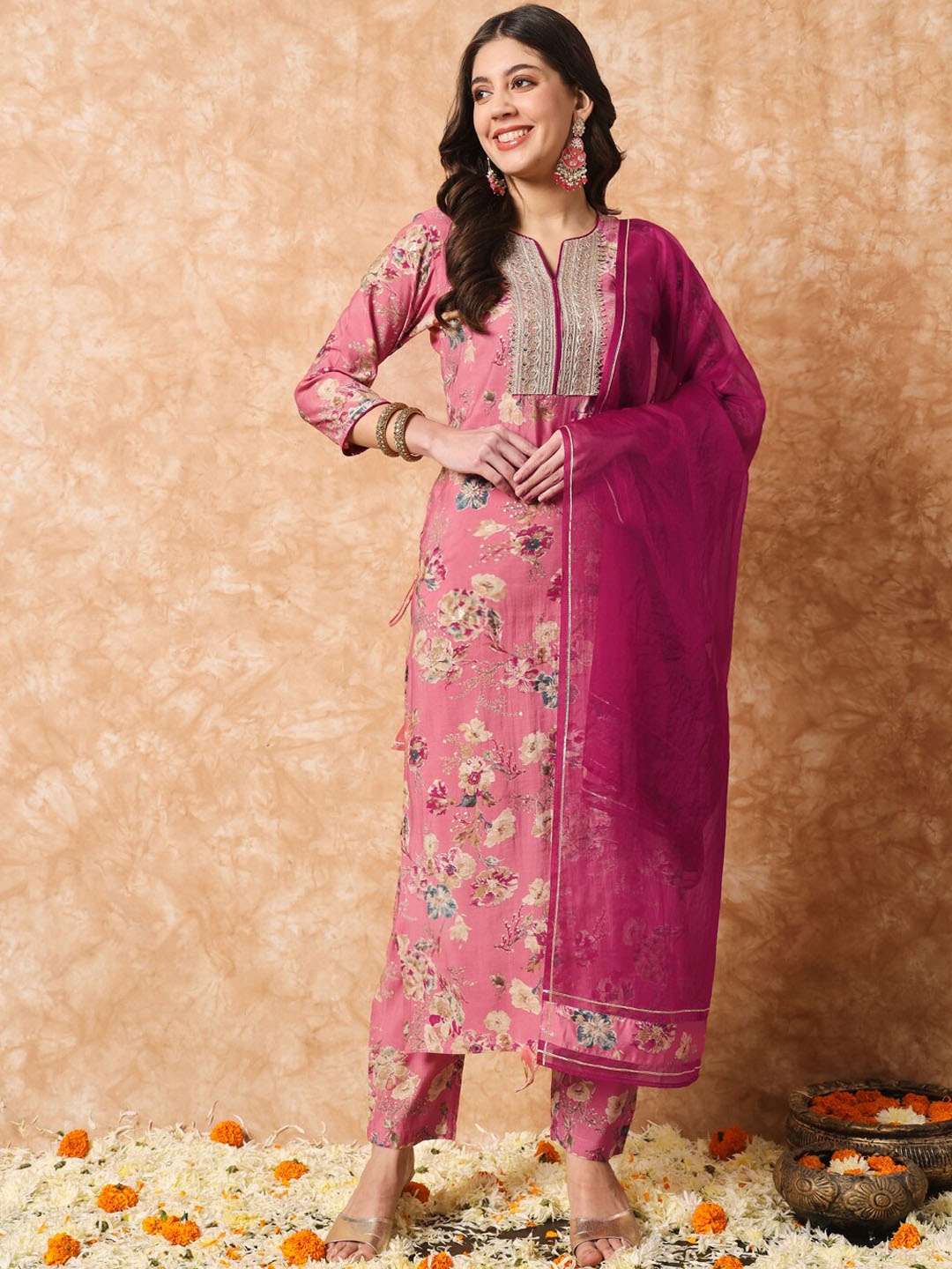 

Meeranshi Women Floral Printed Regular Sequinned Kurta with Trousers & With Dupatta, Mauve