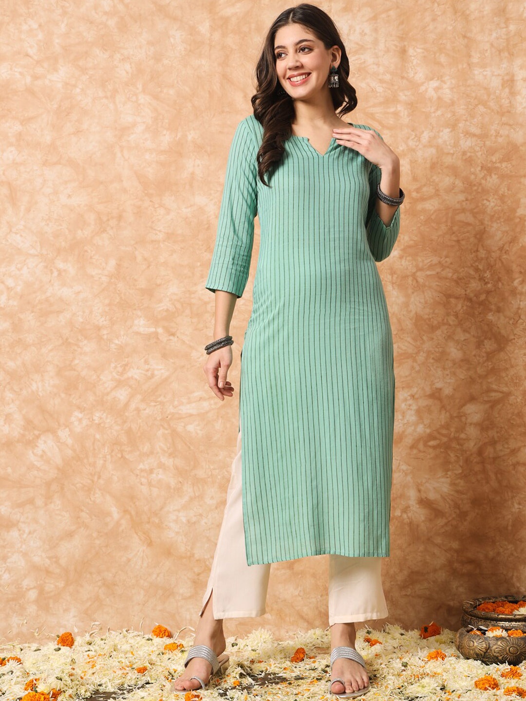 

Meeranshi Vertical Striped Three-Quarter Sleeves Straight Kurta, Green