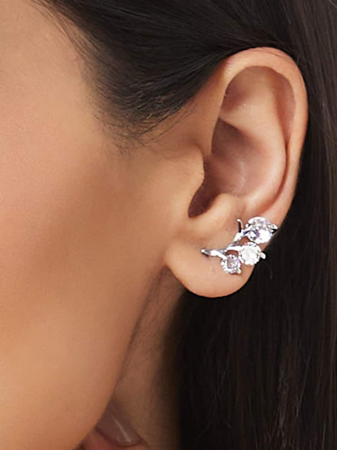 

Globus White Silver-Plated Stone Studded Leaf Shaped Studs Earrings