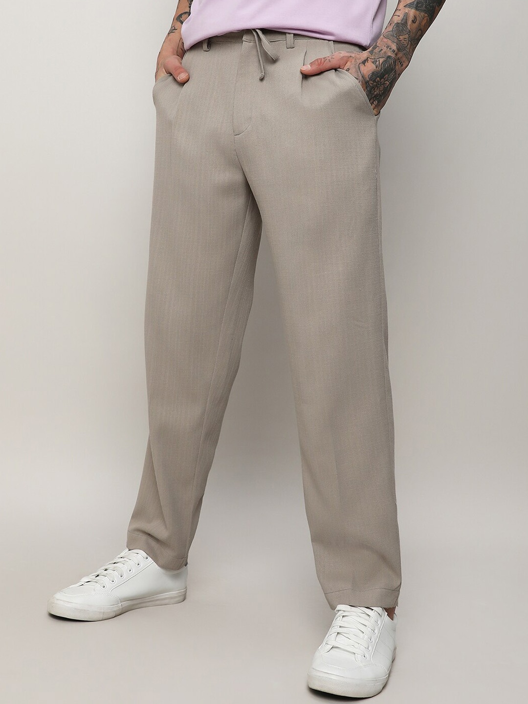 

Campus Sutra Men Beige Relaxed Cotton Easy Wash Trousers