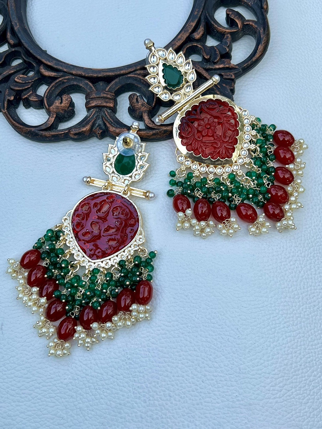 

Prettilicious Gold-Plated Kundan Studded Contemporary Chandbalis