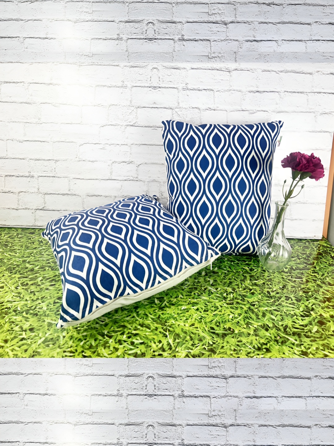 

Pink Parrot Navy Blue & White 2 Pieces Ethnic Motifs Square Cushion Covers