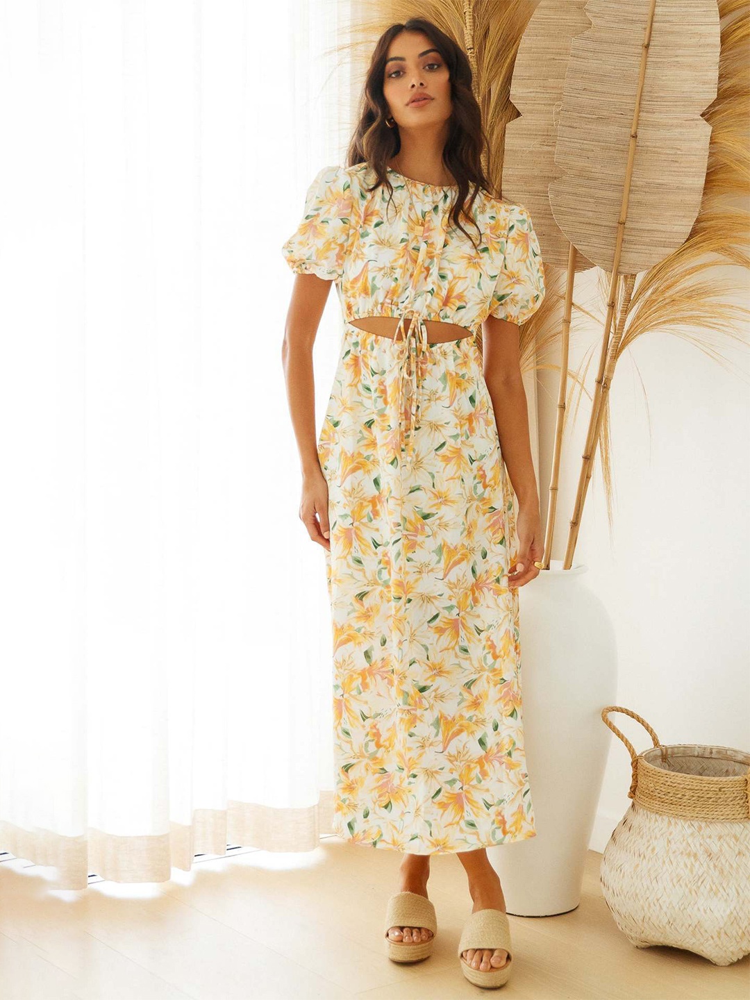 

StyleCast Yellow Floral Printed Boat Neck Puff Sleeve Cut Out & Tie Up A-Line Dress