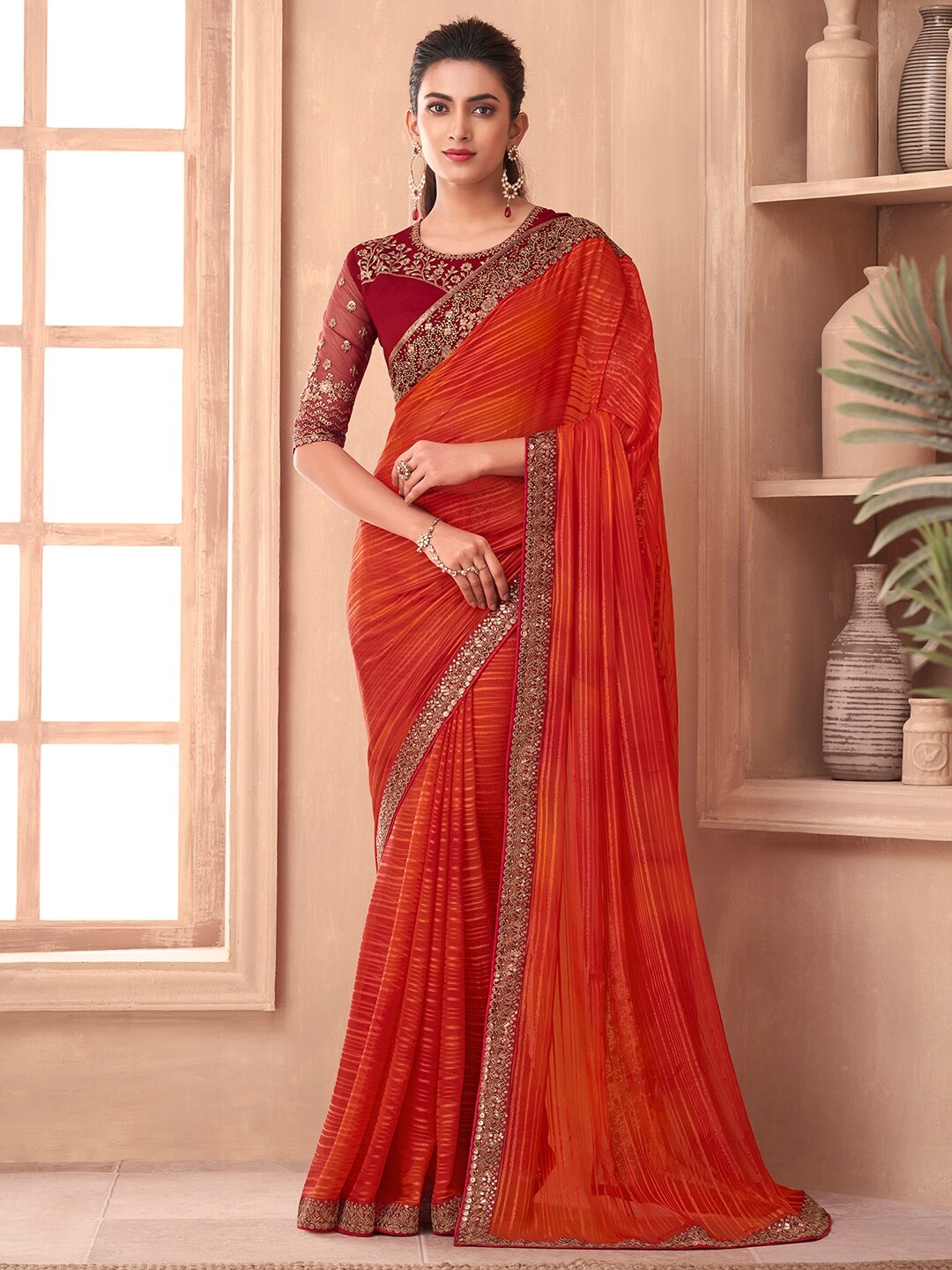 

Saree mall Striped Sequinned Pure Georgette Saree, Orange