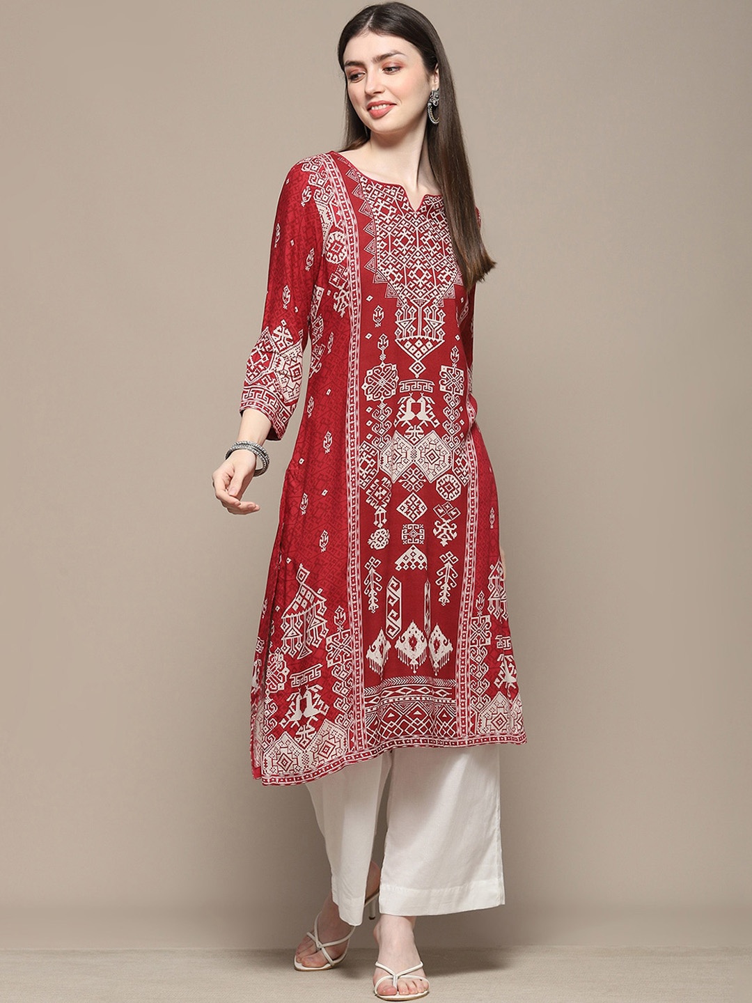 

Biba Ethnic Motifs Printed Notched Neck Straight Kurta, Maroon