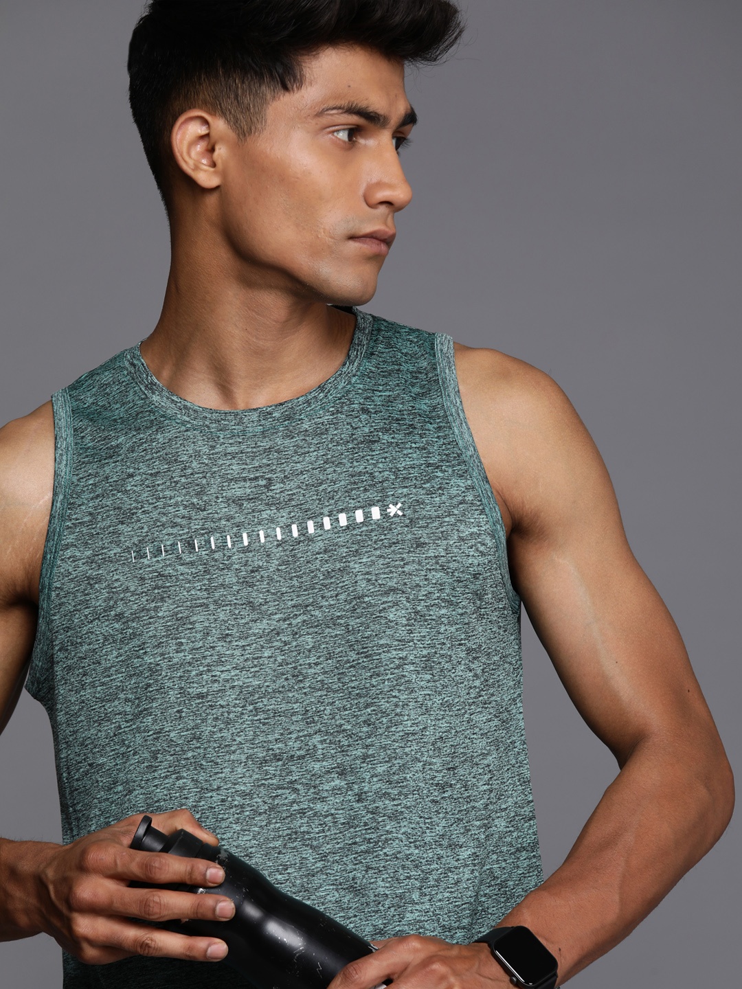 

HRX by Hrithik Roshan Men Self Design T-shirt, Green