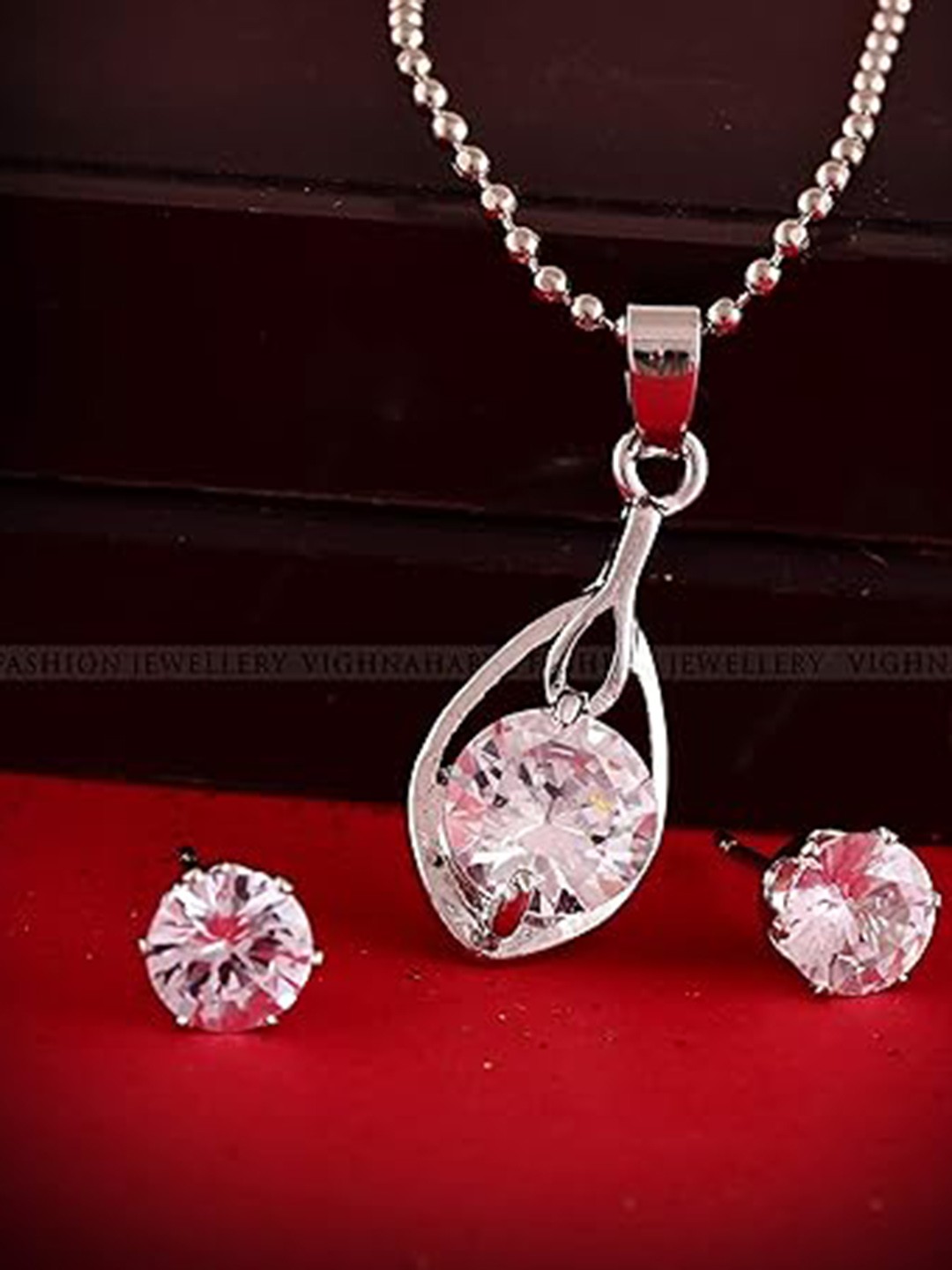 

Vighnaharta Rhodium-Plated Cubic Zirconia Pendant With Earrings, Silver