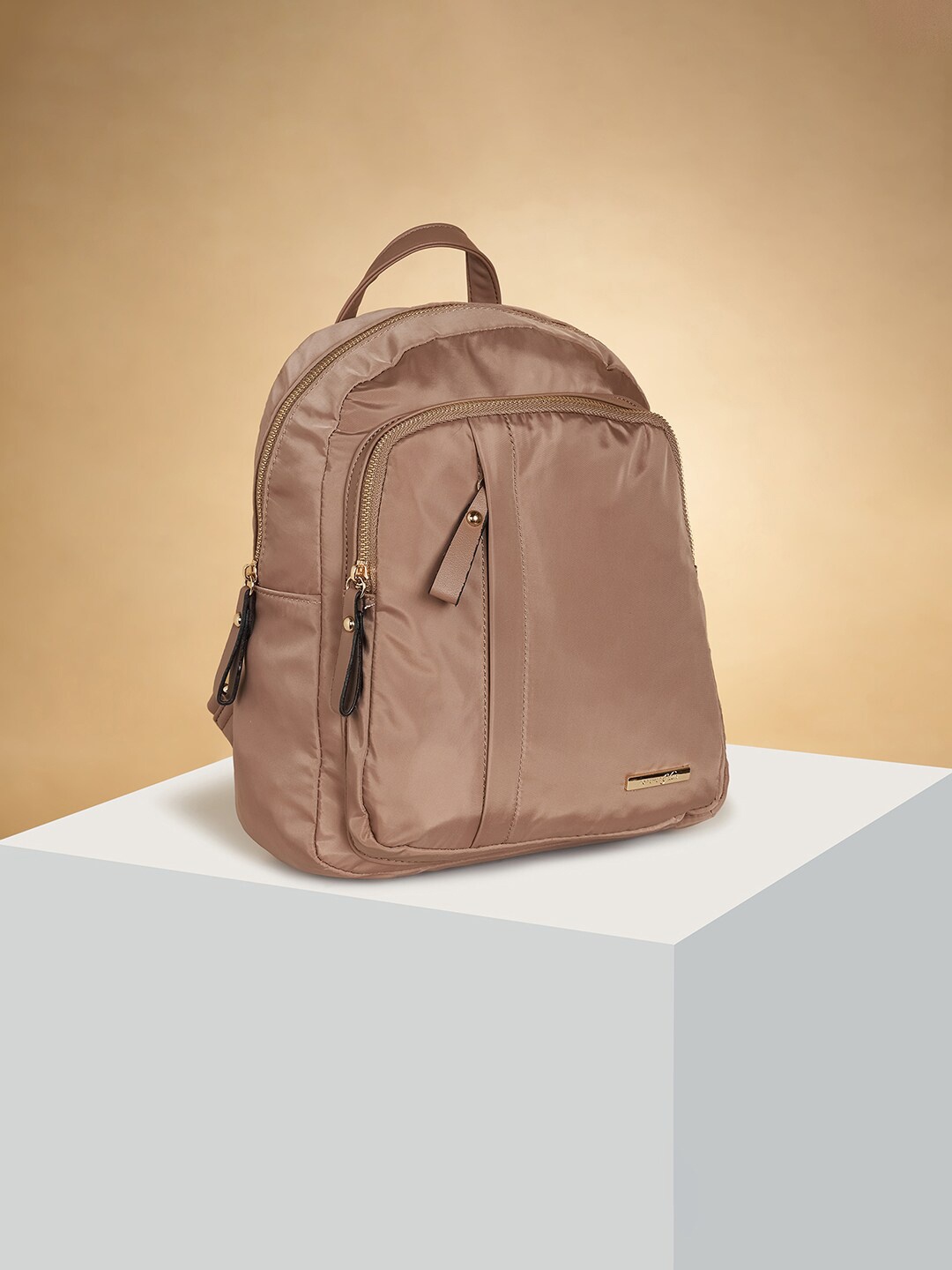 

Forever Glam by Pantaloons Women Small Backpack, Taupe