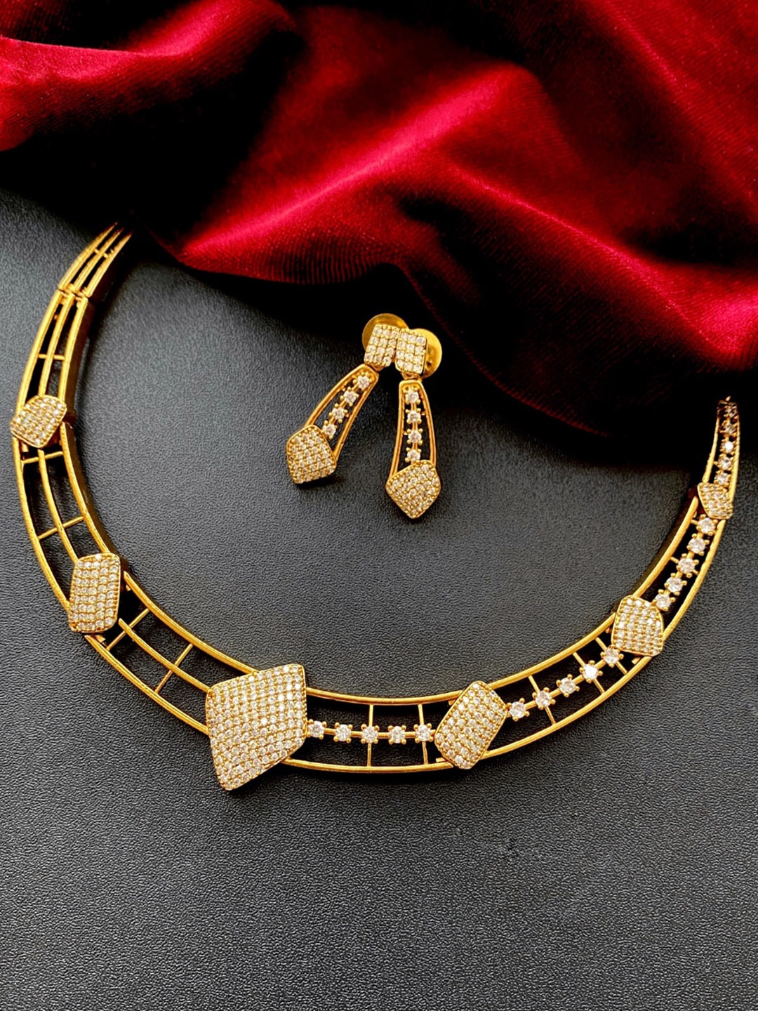 

Pihtara Jewels Gold-Plated American Diamond Studded Jewellery Set