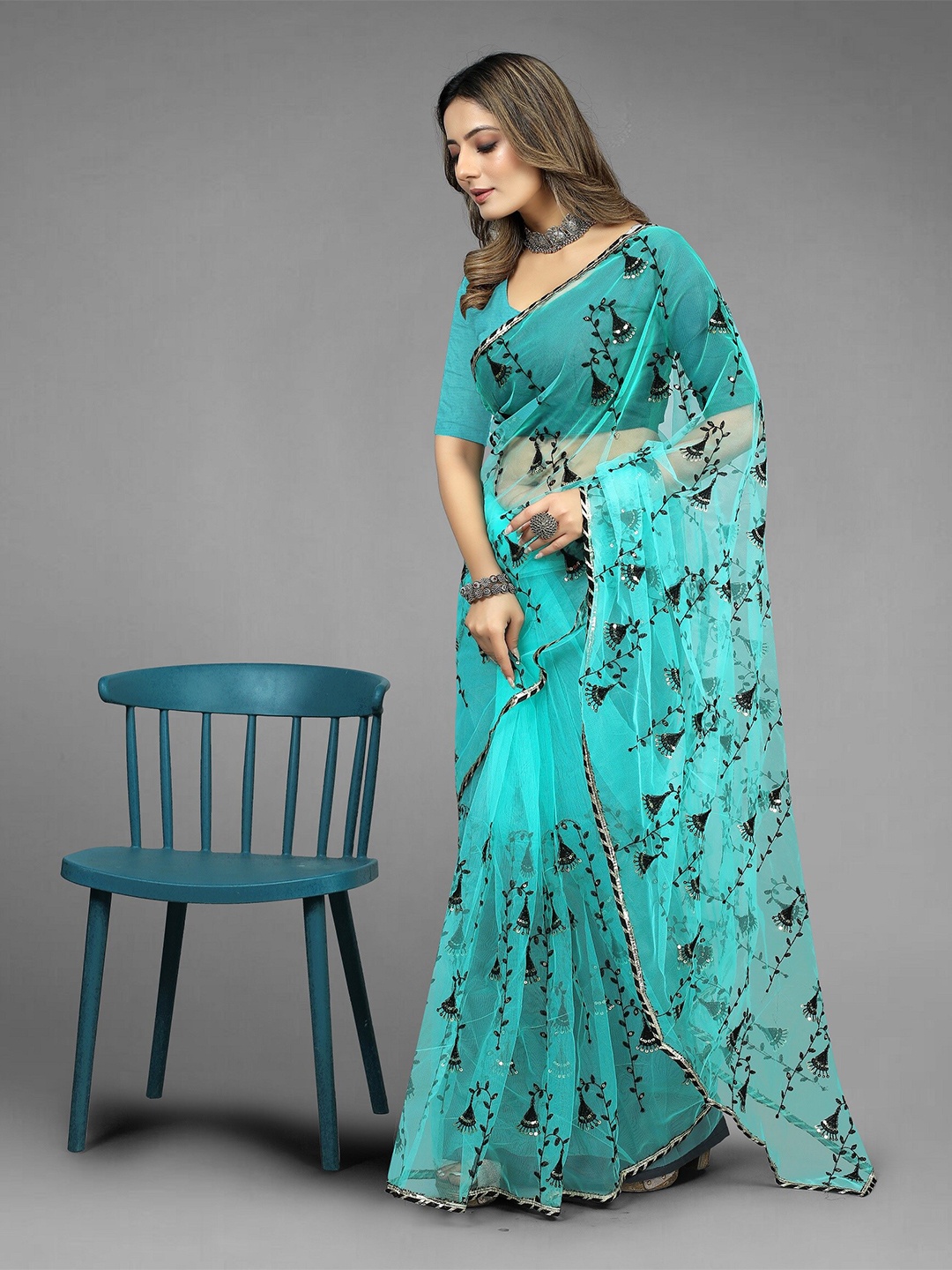 

BARKIYA CREATION Ethnic Motifs Embroidered Embellished Net Saree, Turquoise blue