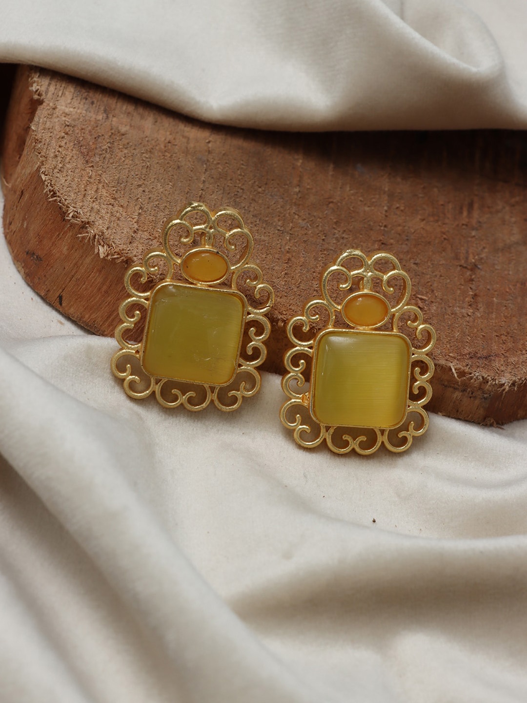 

Ozanoo Gold-Plated Artificial Stones Studded Geometric Studs Earrings, Yellow