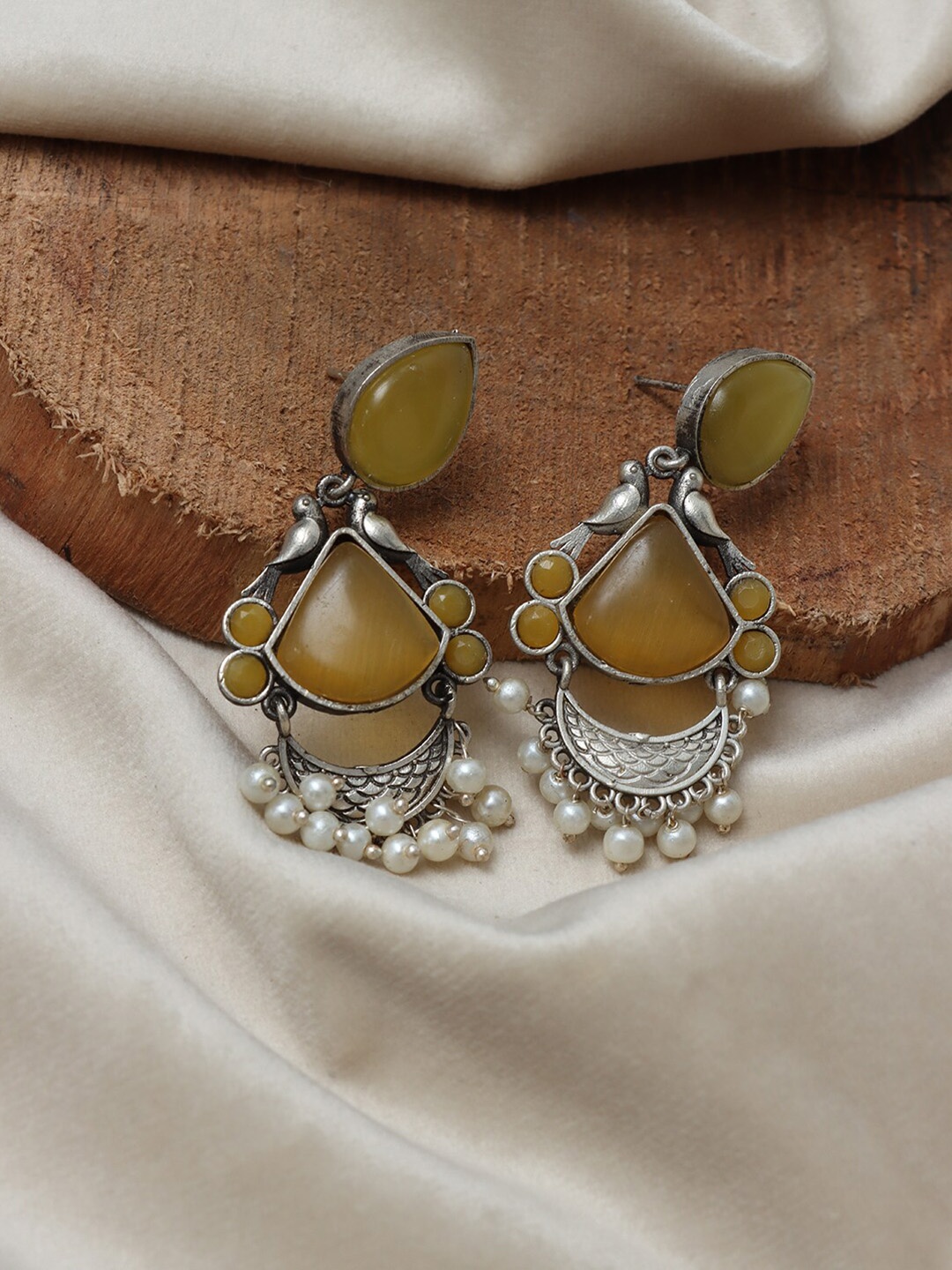 

Ozanoo Silver-Plated Artificial Stones Studded Drop Earrings, Yellow