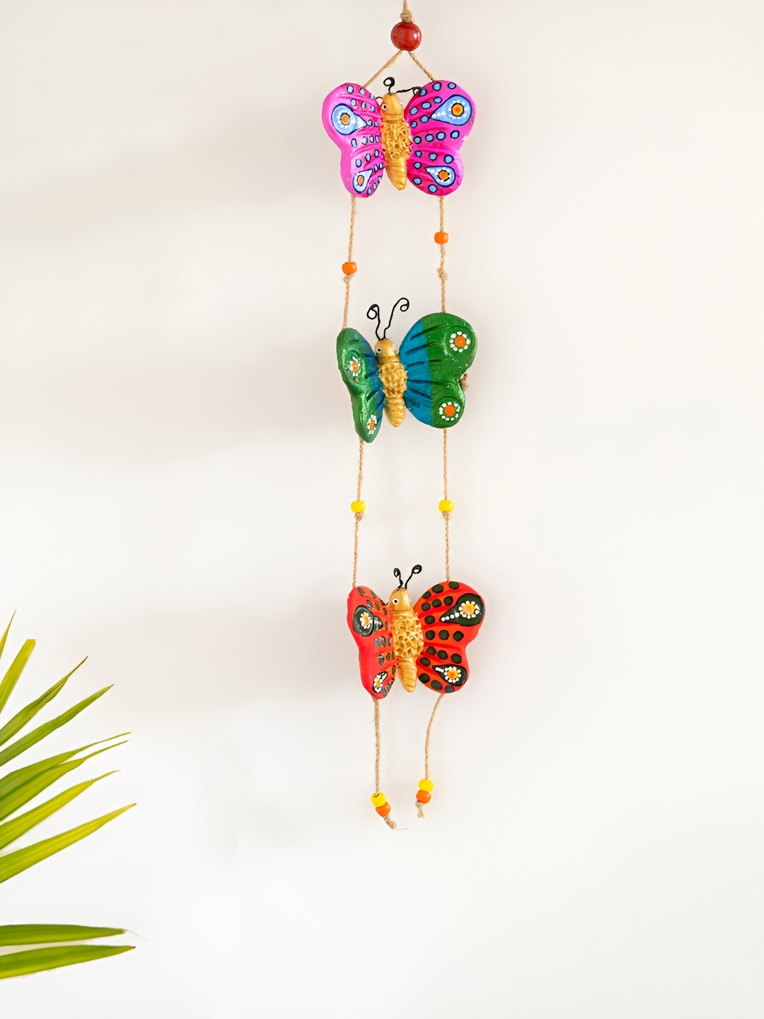 

ExclusiveLane Radiant Butterfliers Handmade Handpainted Terracotta Decorative Wall Hanging, Pink