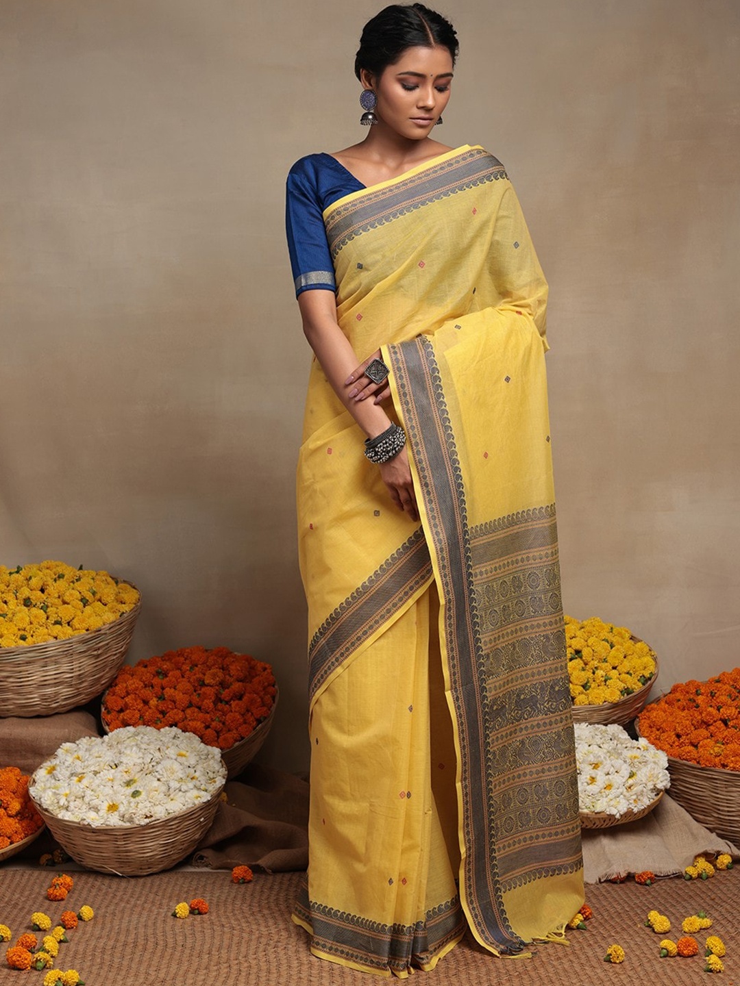 

Sutra Art of Clothing Ethnic Motifs Woven Design Pure Cotton Saree, Yellow