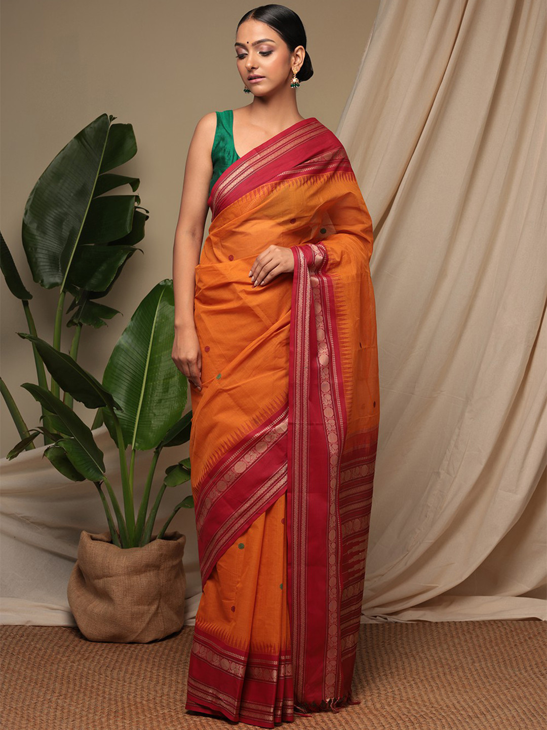 

Sutra Art of Clothing Ethnic Motifs Woven Design Zari Pure Cotton Saree, Orange