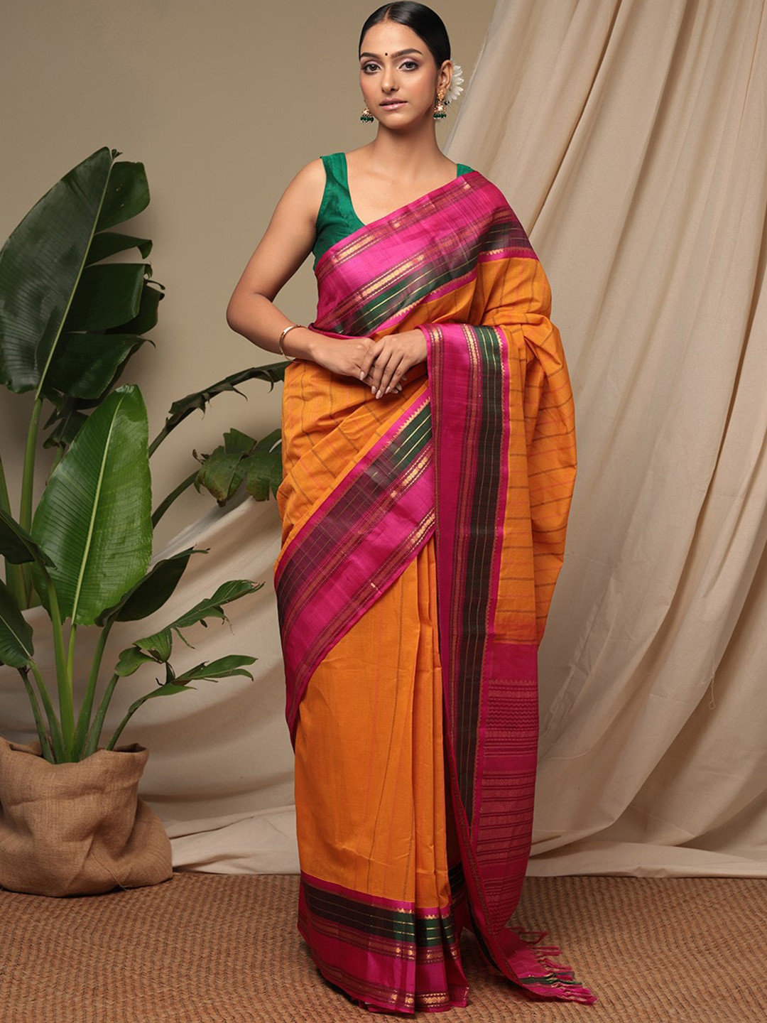 

Sutra Art of Clothing Striped Woven Design Zari Pure Cotton Saree, Orange
