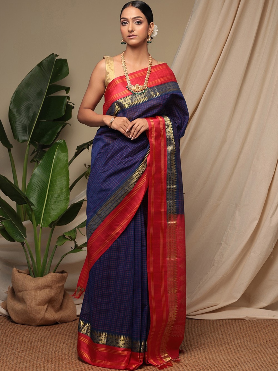 

Sutra Art of Clothing Checked Woven Design Zari Pure Cotton Saree, Violet