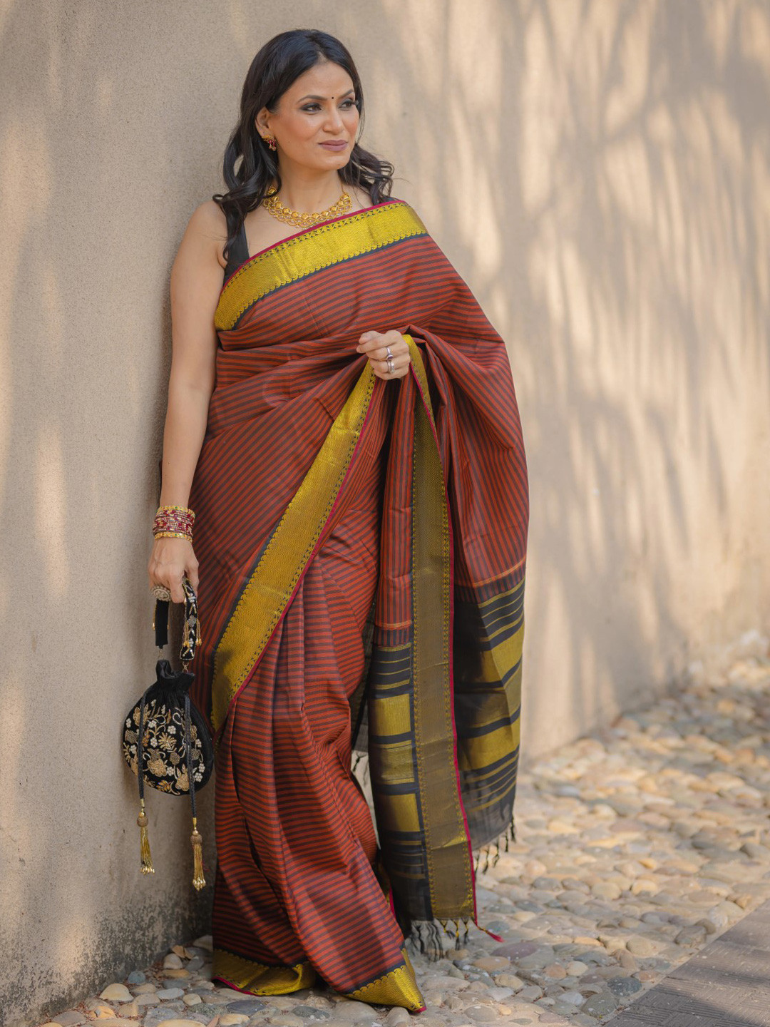 

Sutra Art of Clothing Striped Woven Design Zari Pure Silk Saree, Orange