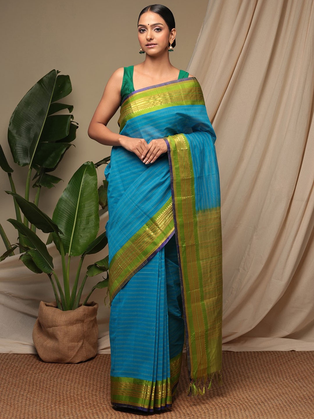 

Sutra Art of Clothing Striped Woven Design Zari Pure Cotton Saree, Blue