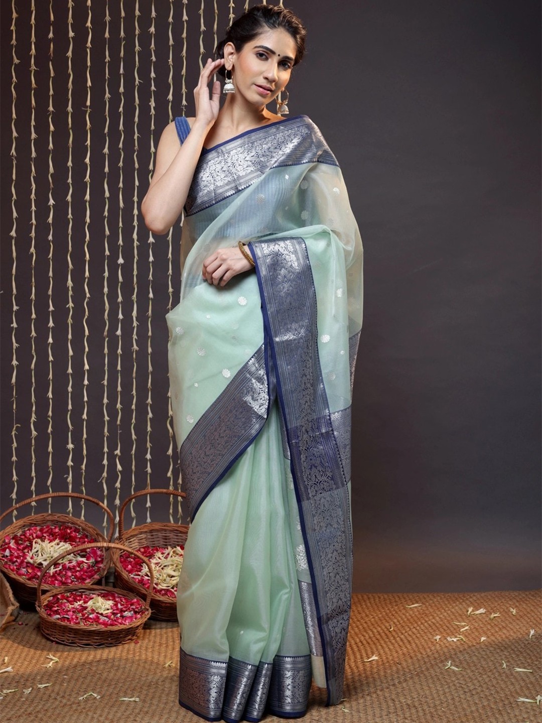 

Sutra Art of Clothing Woven Design Zari Pure Silk Saree, Green