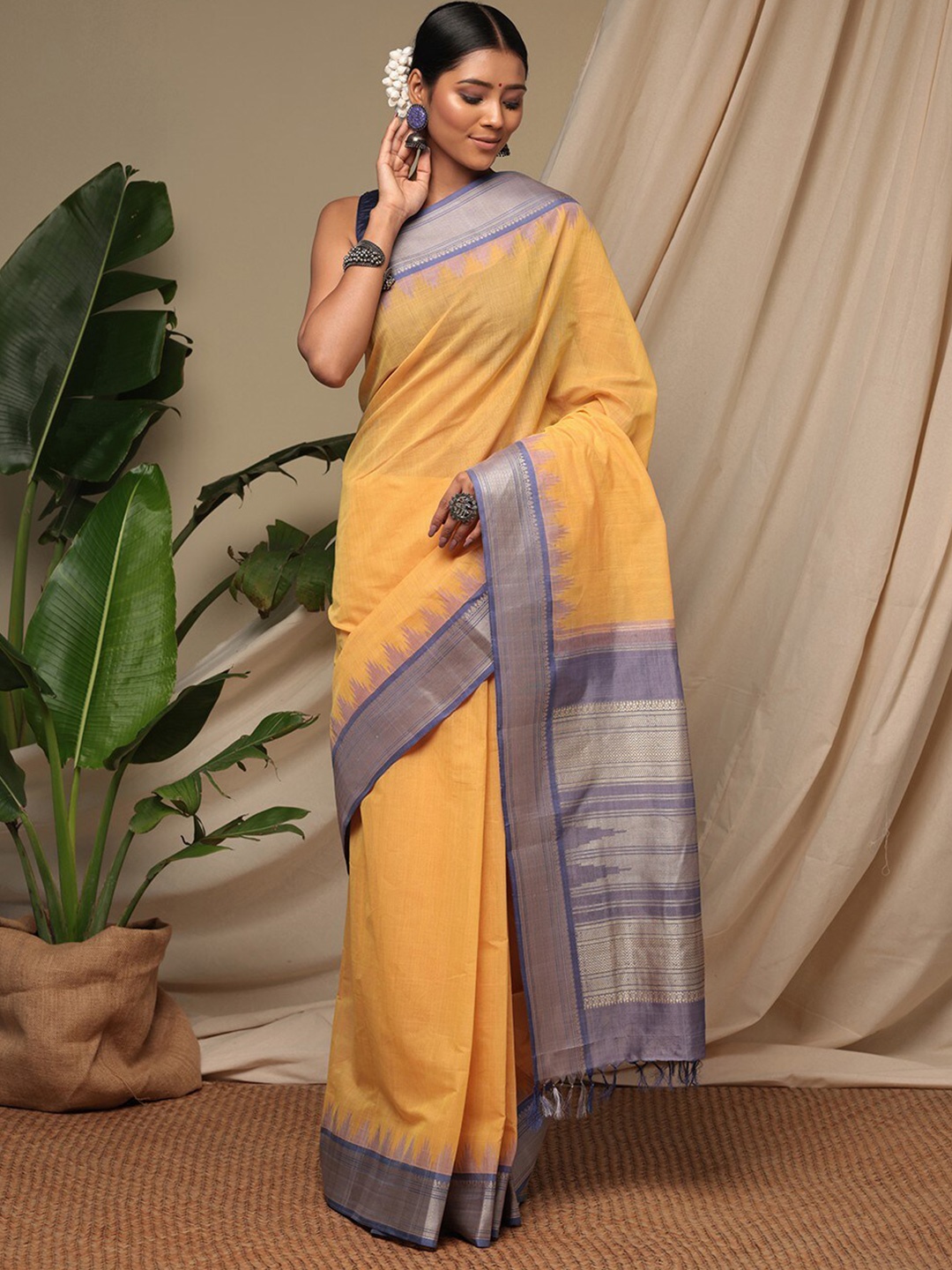 

Sutra Art of Clothing Woven Design Zari Pure Cotton Saree, Yellow