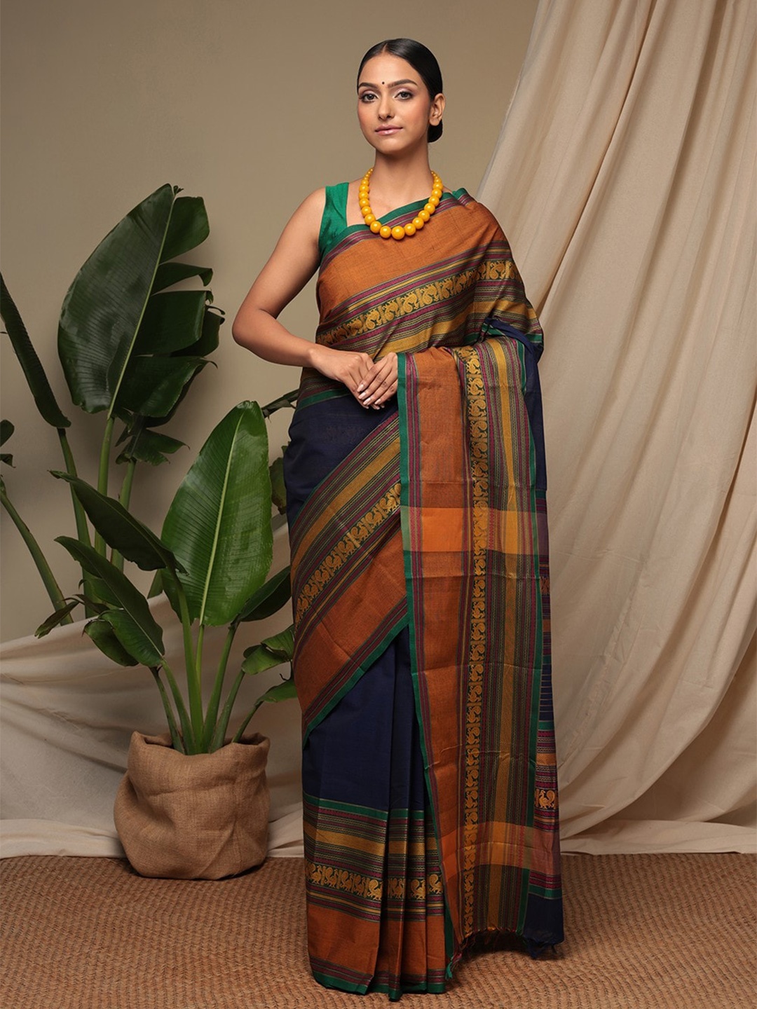 

Sutra Art of Clothing Ethnic Motifs Woven Design Pure Cotton Saree, Blue