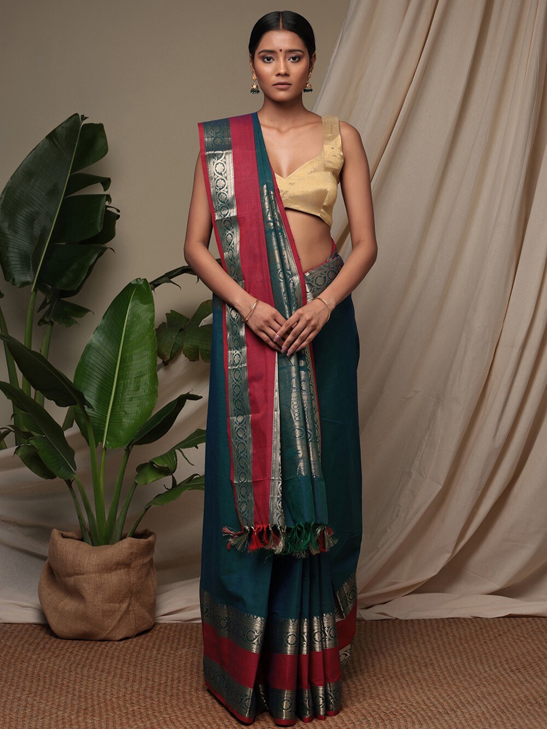 

Sutra Art of Clothing Woven Design Zari Pure Cotton Saree, Blue