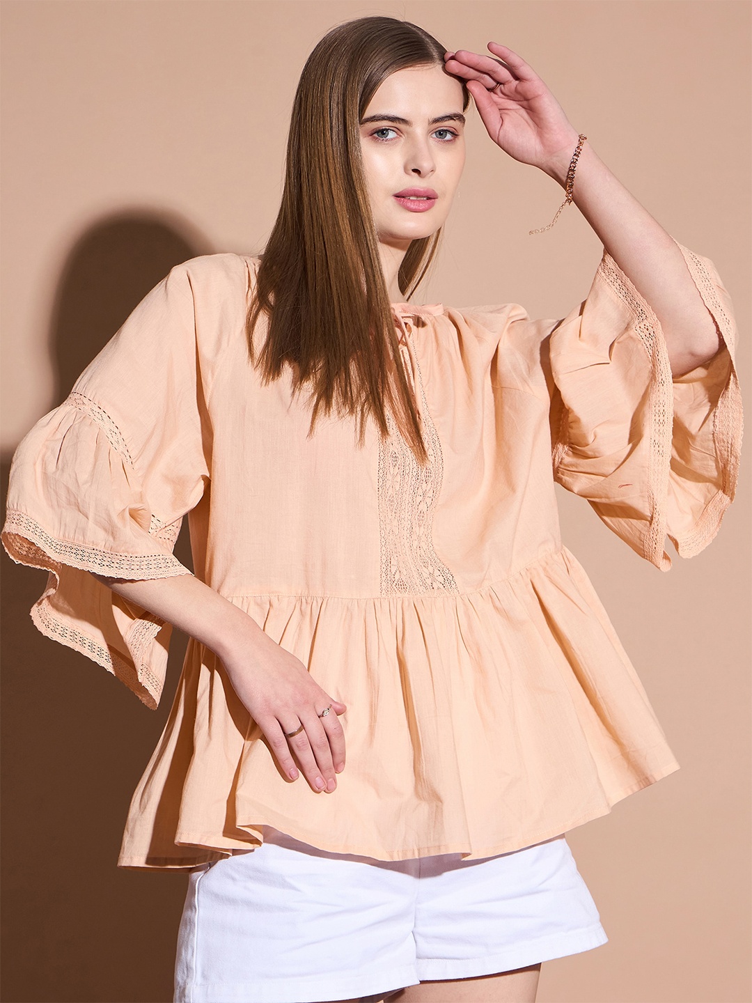 

DressBerry Peach Gathered Or Pleated Cotton Tie-Up Neck Bell Sleeve Cotton Casual Top