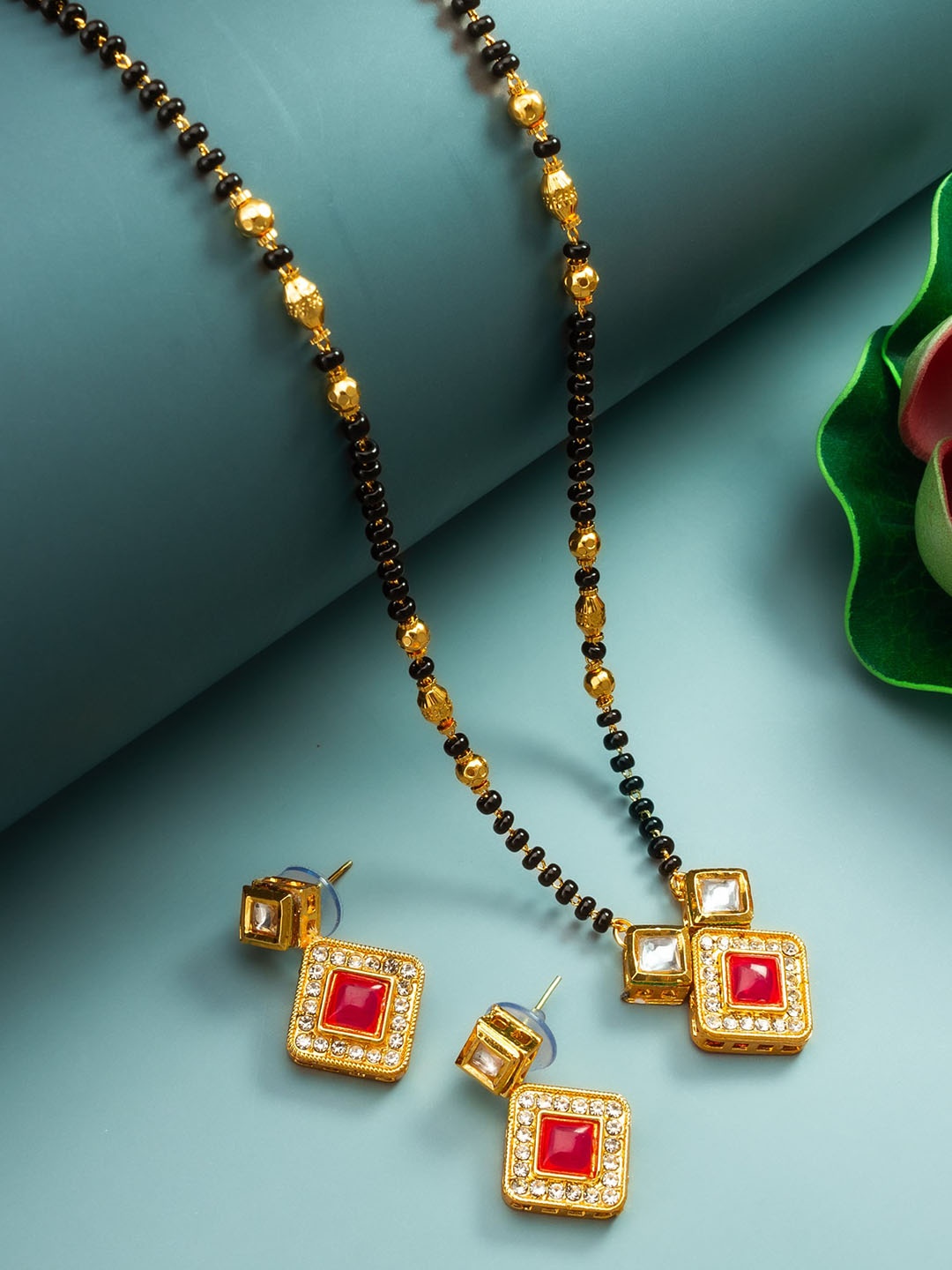 

aadita Gold-Plated Kundan Stone Studded and Beaded Mangalsutra