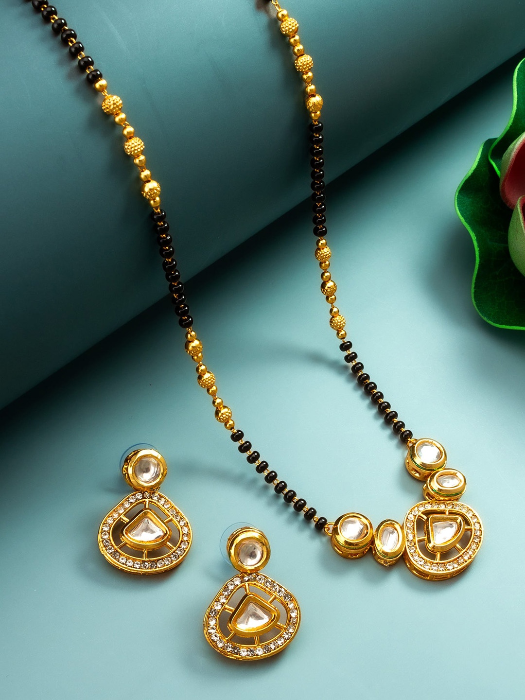 

aadita Gold-Plated Kundan Stone Studded and Beaded Mangalsutra