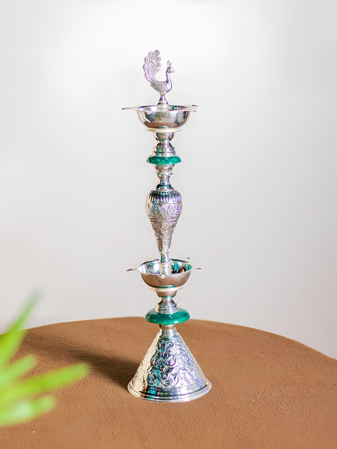 

THEDECORKART Silver-Toned Super Embossed Peacock Brass Diya