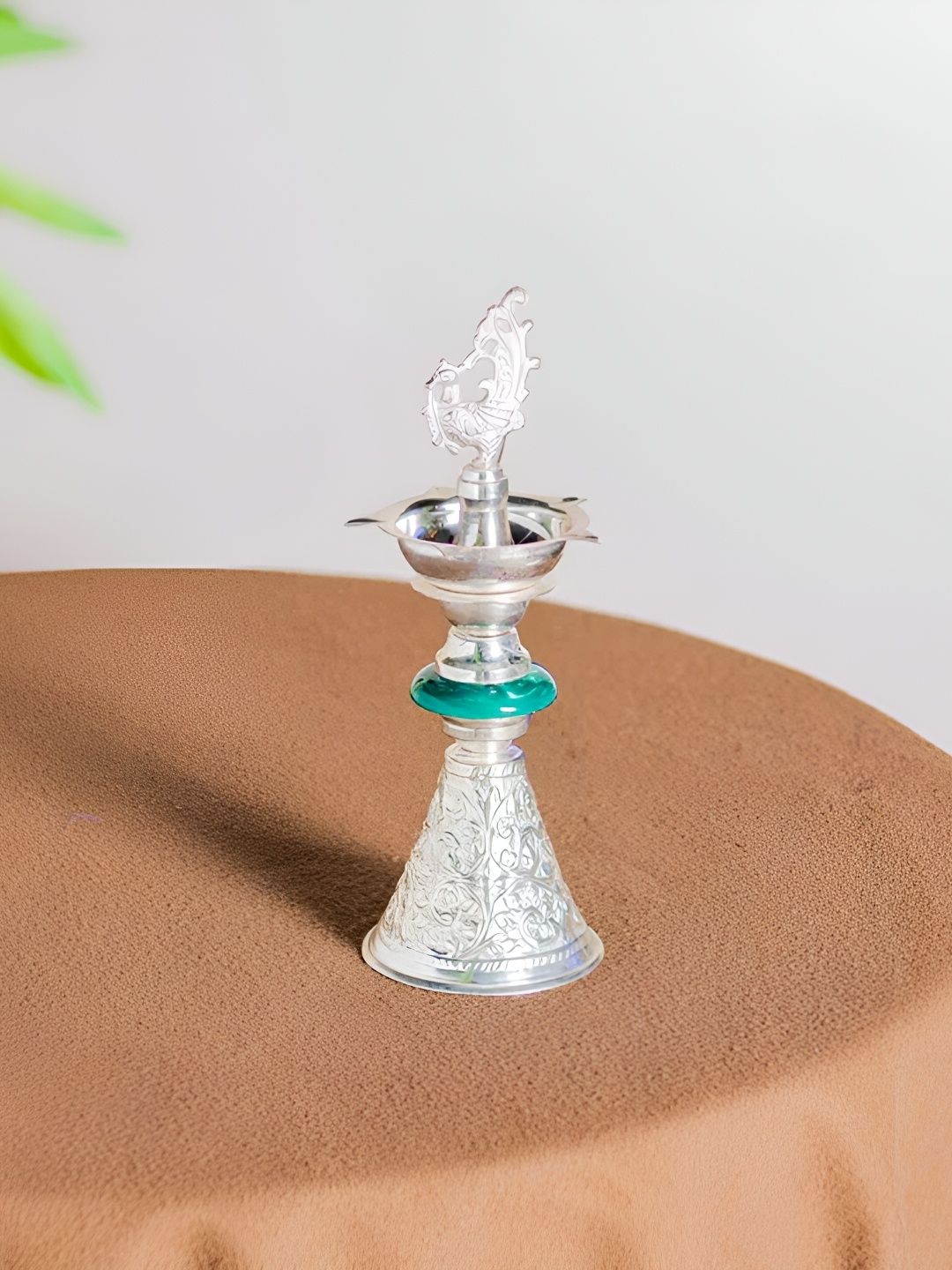 

THEDECORKART Super Embossed Peacock Brass Diya, Silver