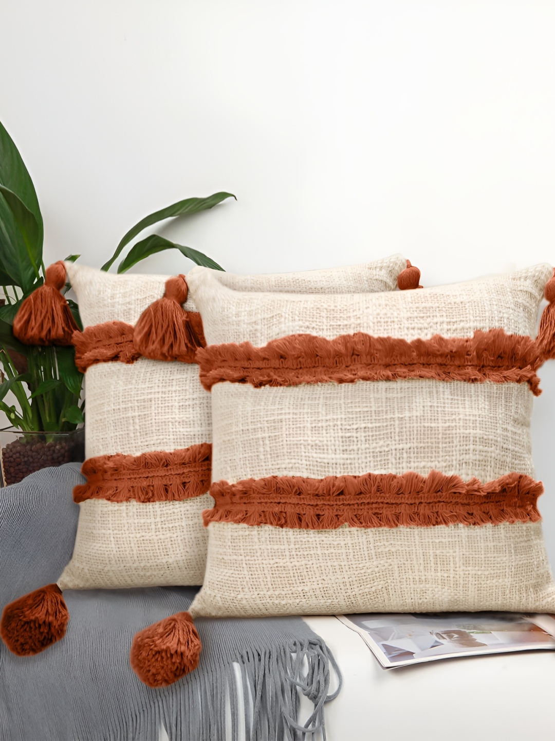 

BIRD WING Cream Coloured & Rust Self Design 2 Pieces Cotton Square Cushion Covers