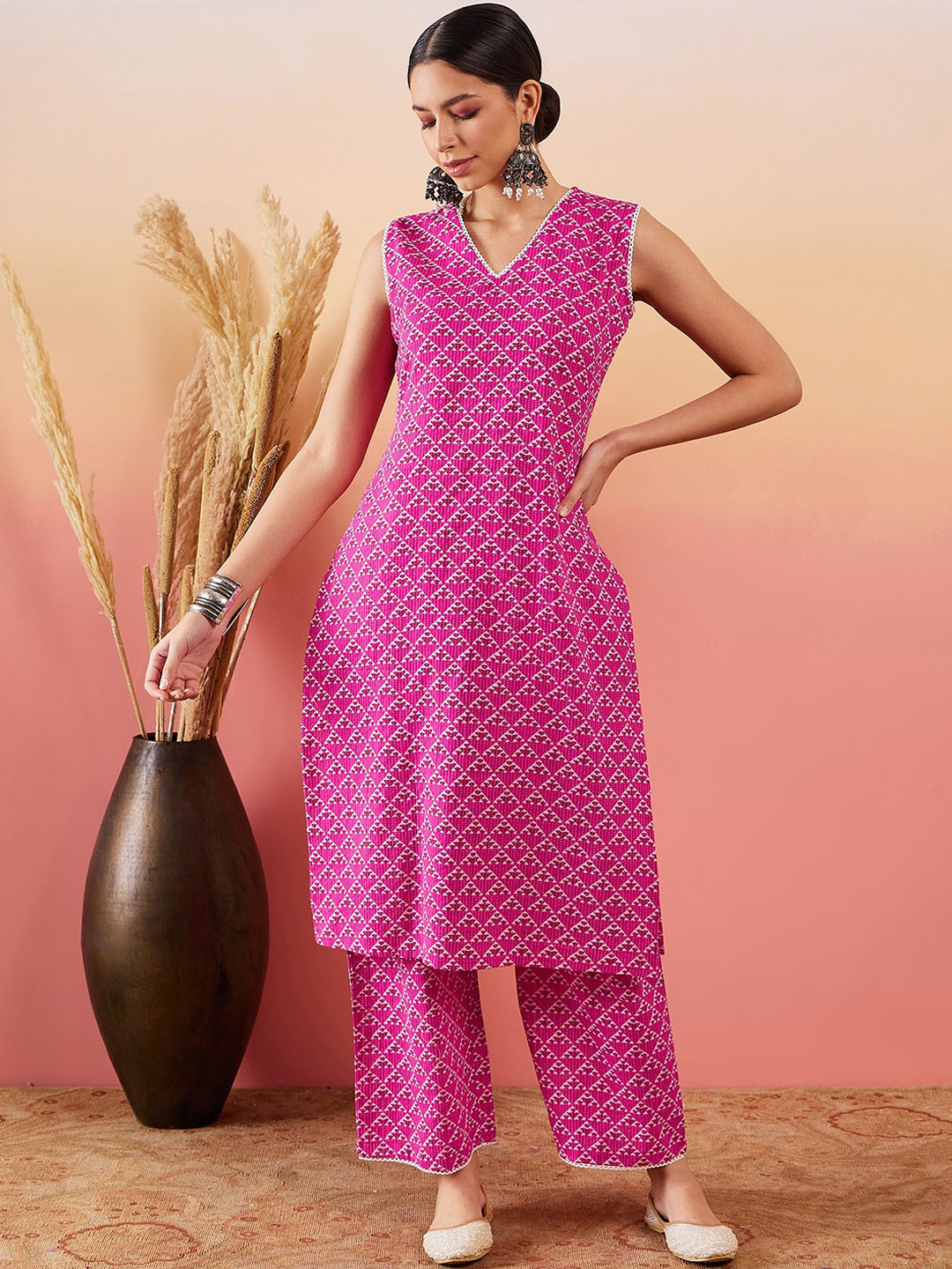 

InWeave Geometric Printed Sleeveless Pure Cotton Straight Kurta With Trouser, Pink