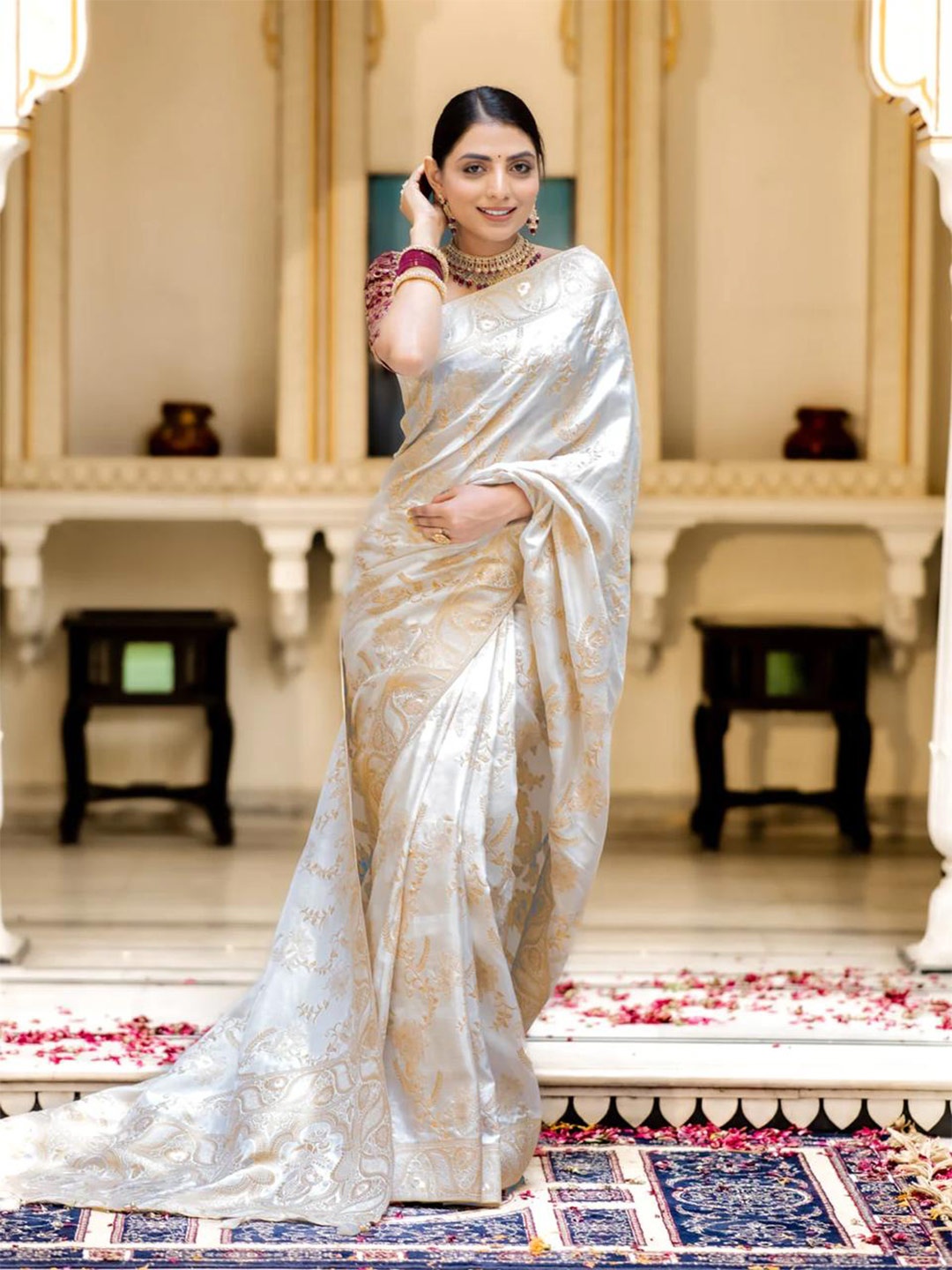 

Mitera White & Gold toned Ethnic Motifs Woven Design Zari Art Silk Saree