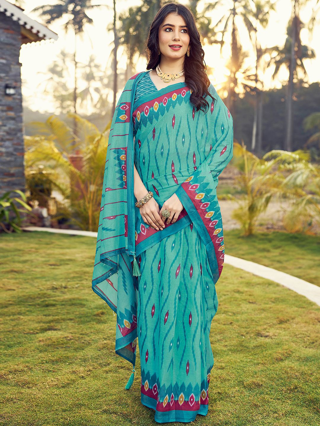 

Mitera Blue & Pink Ethnic Motifs Printed Ikat Ready To Wear Saree