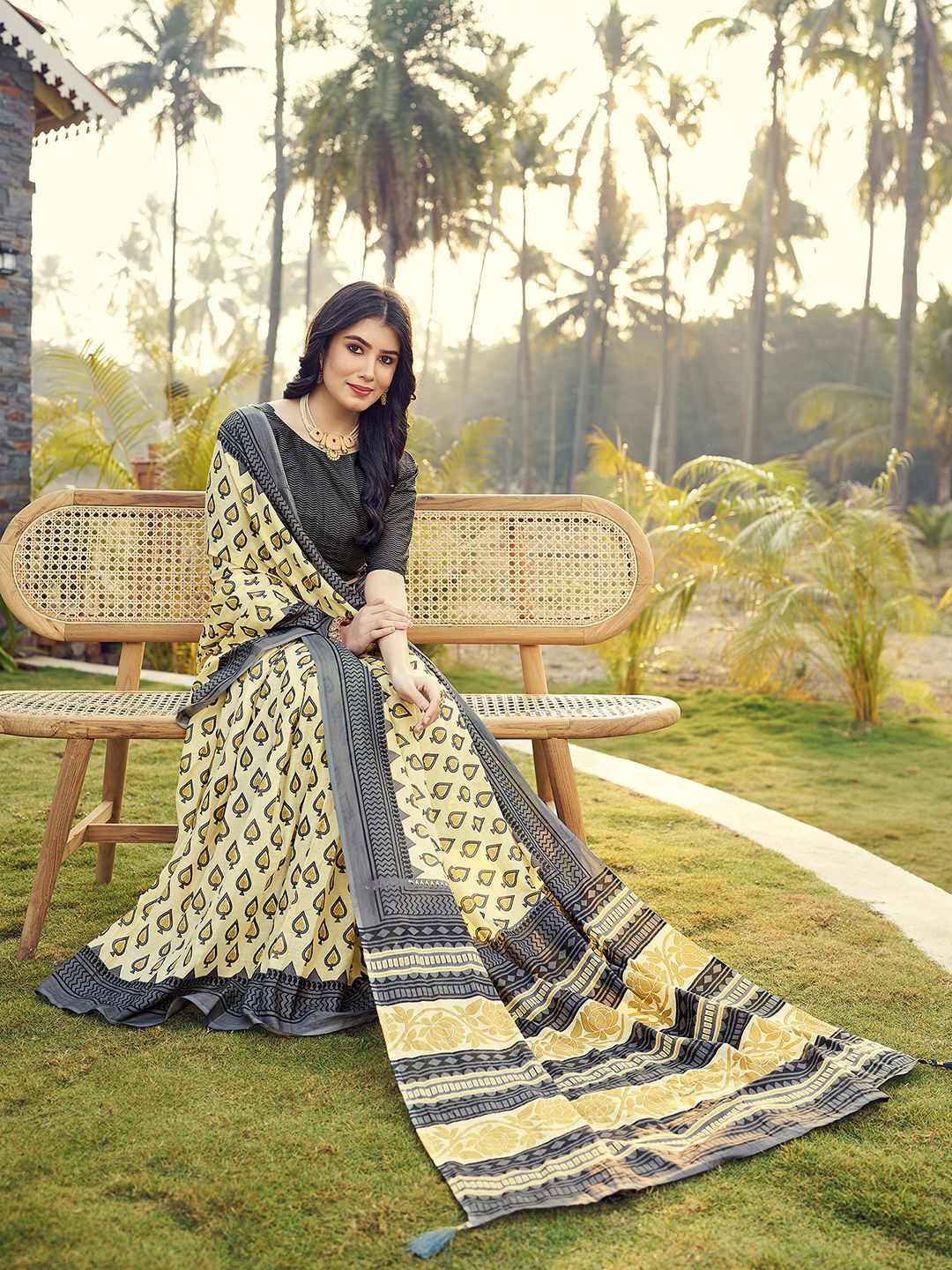 

Mitera Yellow & Grey Ethnic Motifs Printed Ikat Ready To Wear Saree