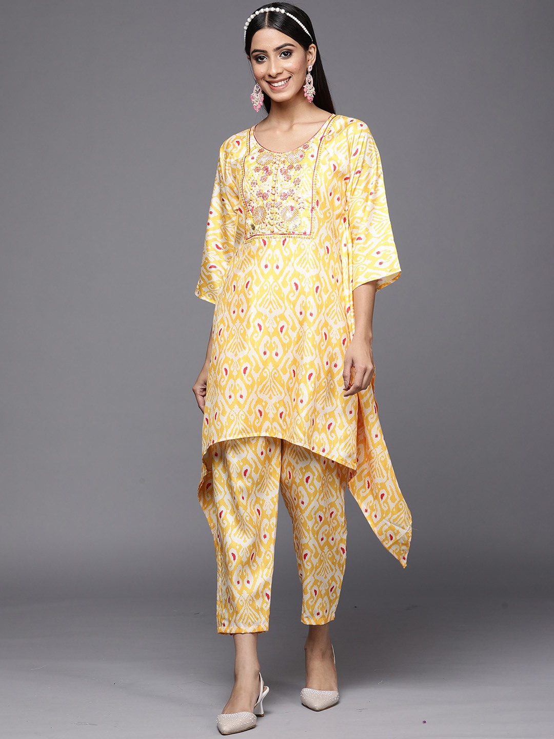 

Indo Era Yellow Paisley Embroidered Round Neck Straight Kurta with Trousers